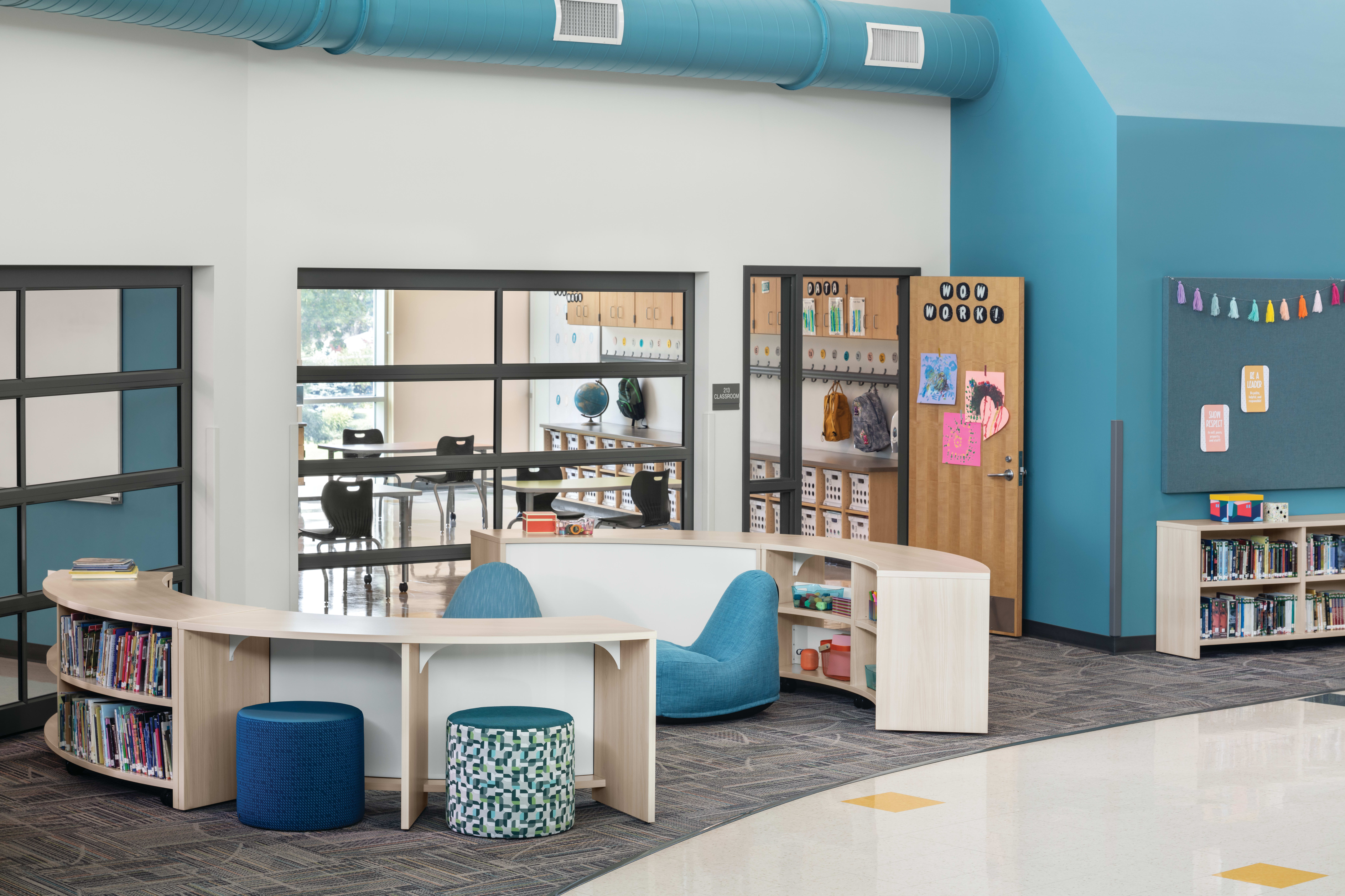 Storyline Bookcases and Bistro Tables with Confetti Floor Lounge and Flock Minis.