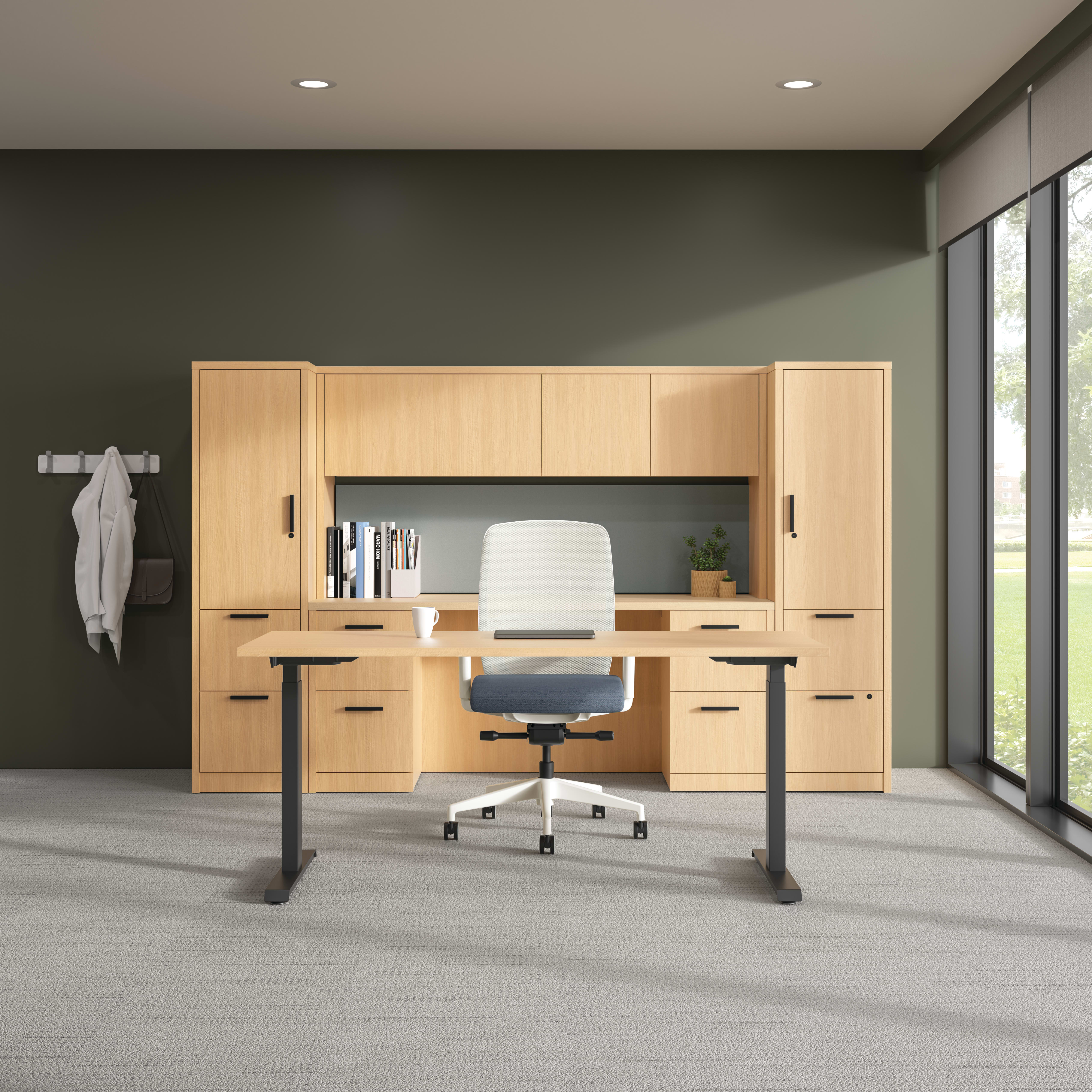 10500 Series executive office shown with a height-adjustable workstation and Nucleus task chair