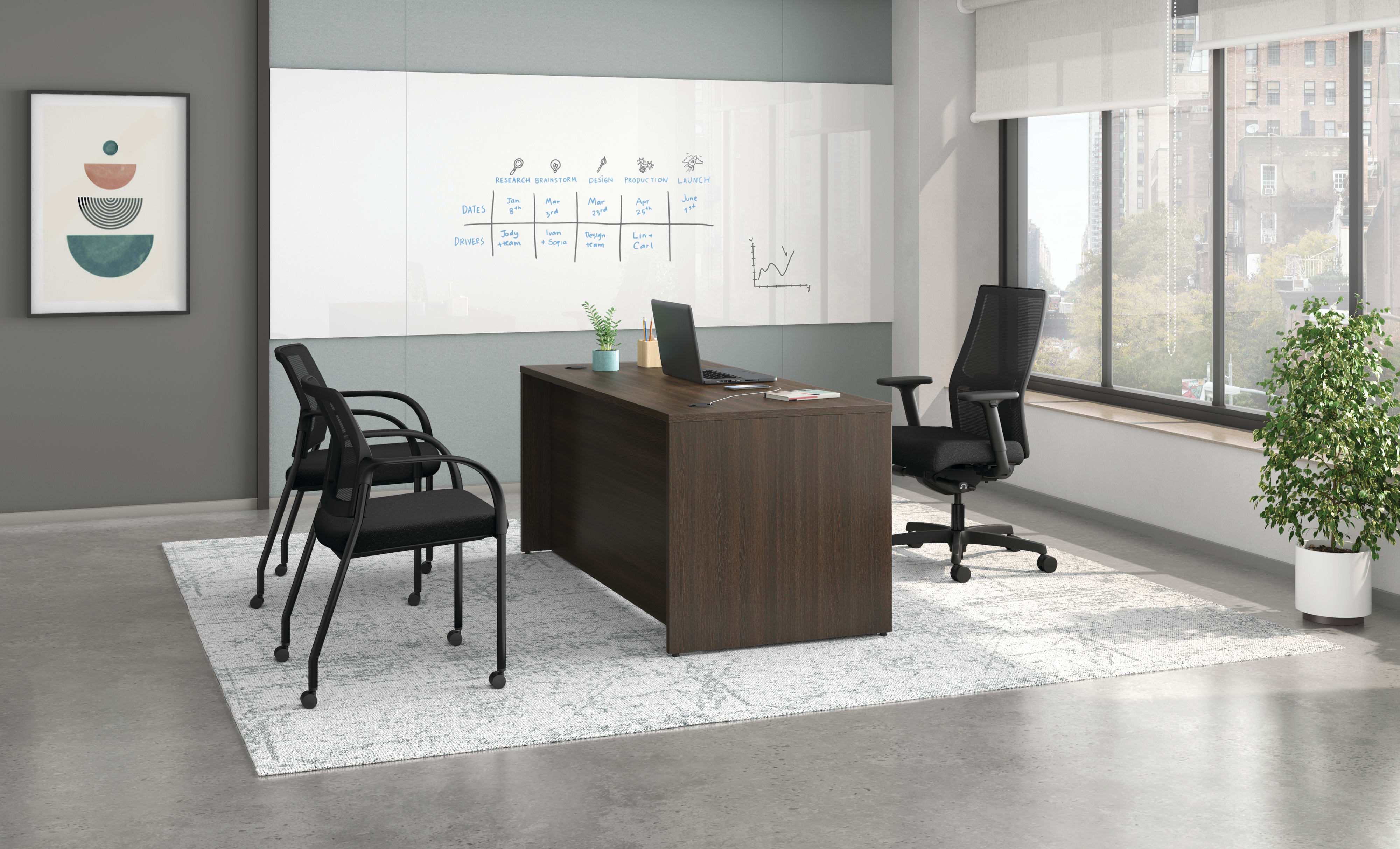 Mod desk with Ignition task and guest seating.