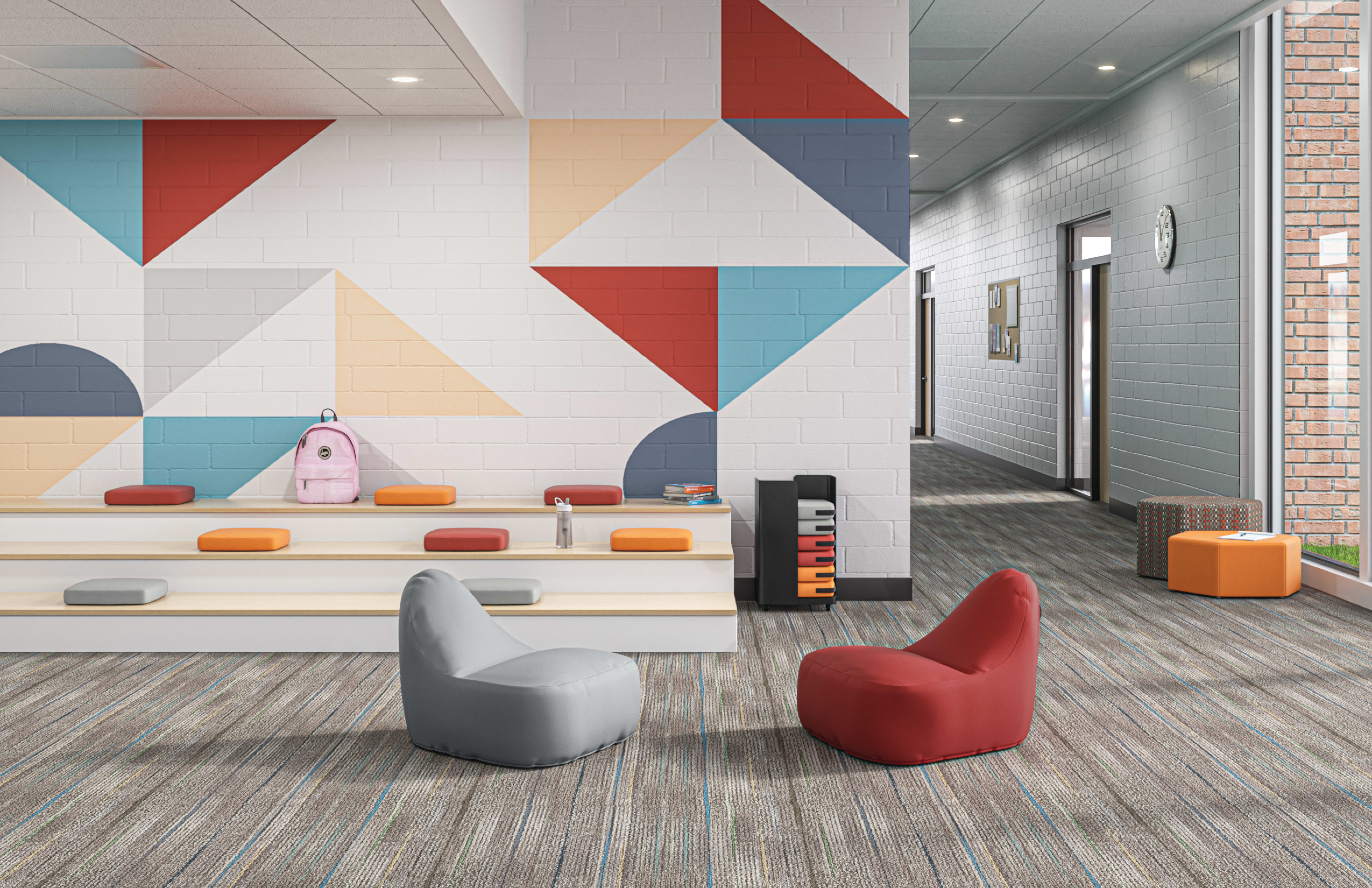 Confetti Floor Lounge and Floor Cushions with Confetti Storage Cart and Tangram Poufs.