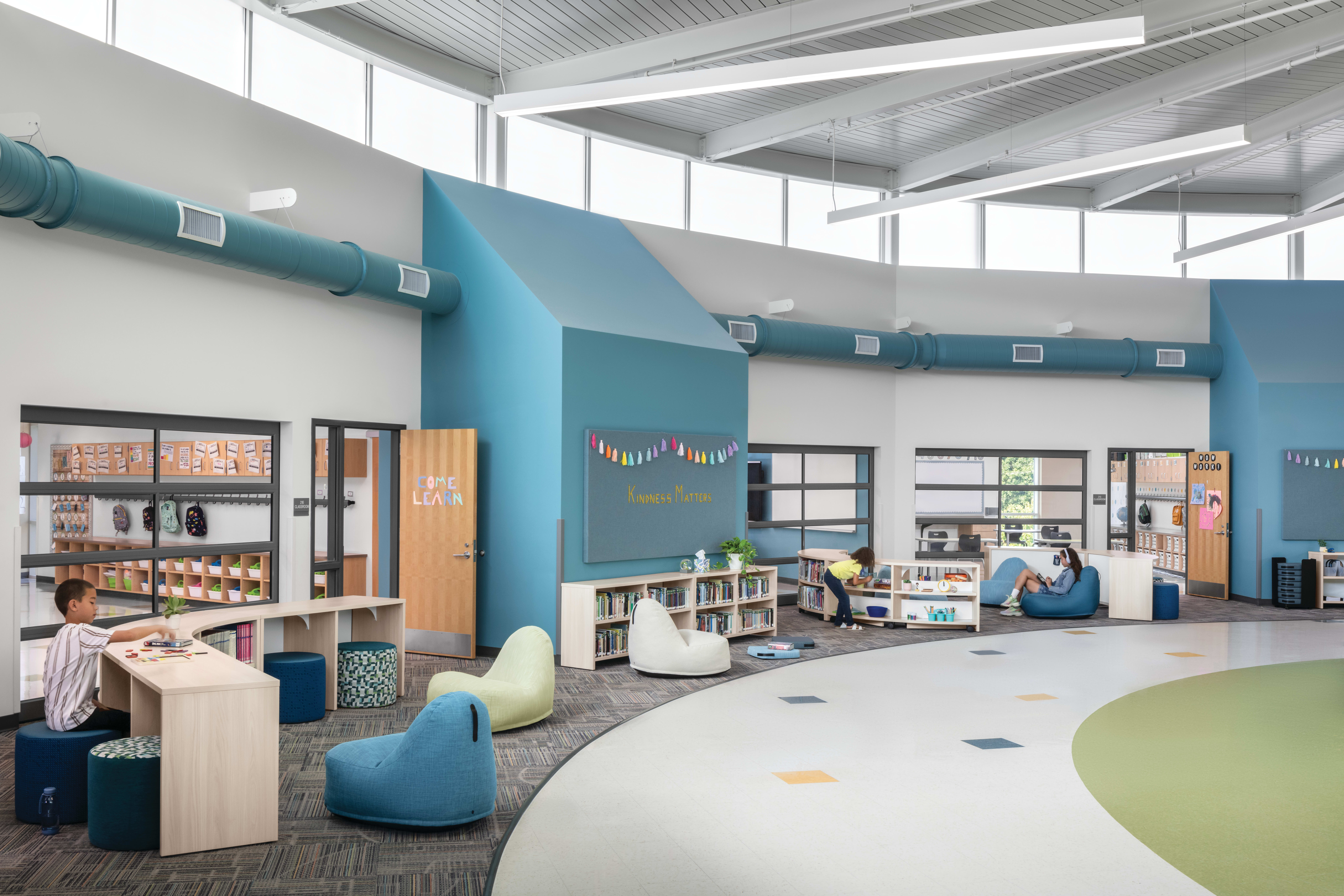 Storyline Bookcases and Bistro Tables with Confetti Floor Lounge and Flock Minis.