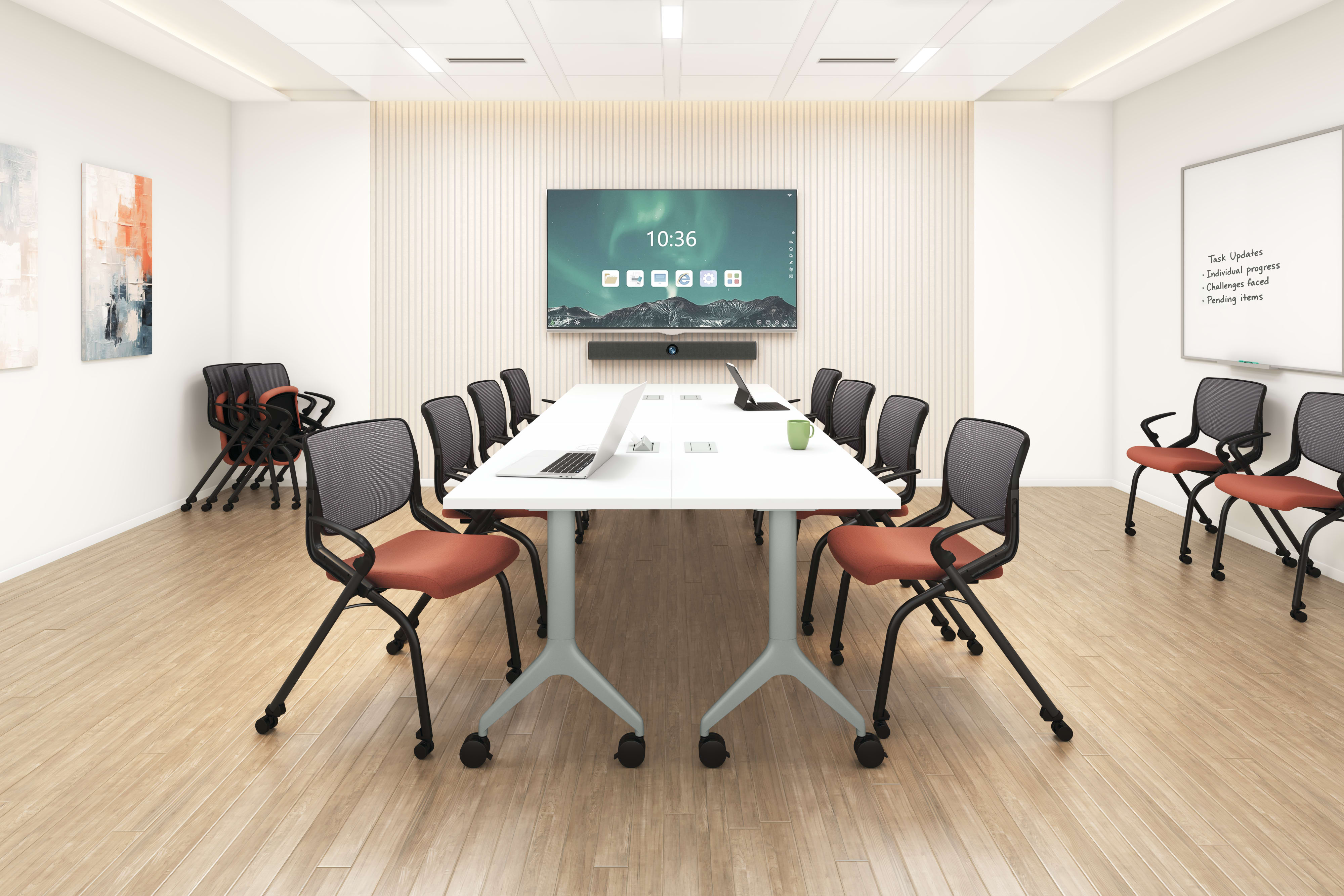 Modern conference room with two white tables, black mesh chairs with red seats, large wall-mounted display, and wood flooring.