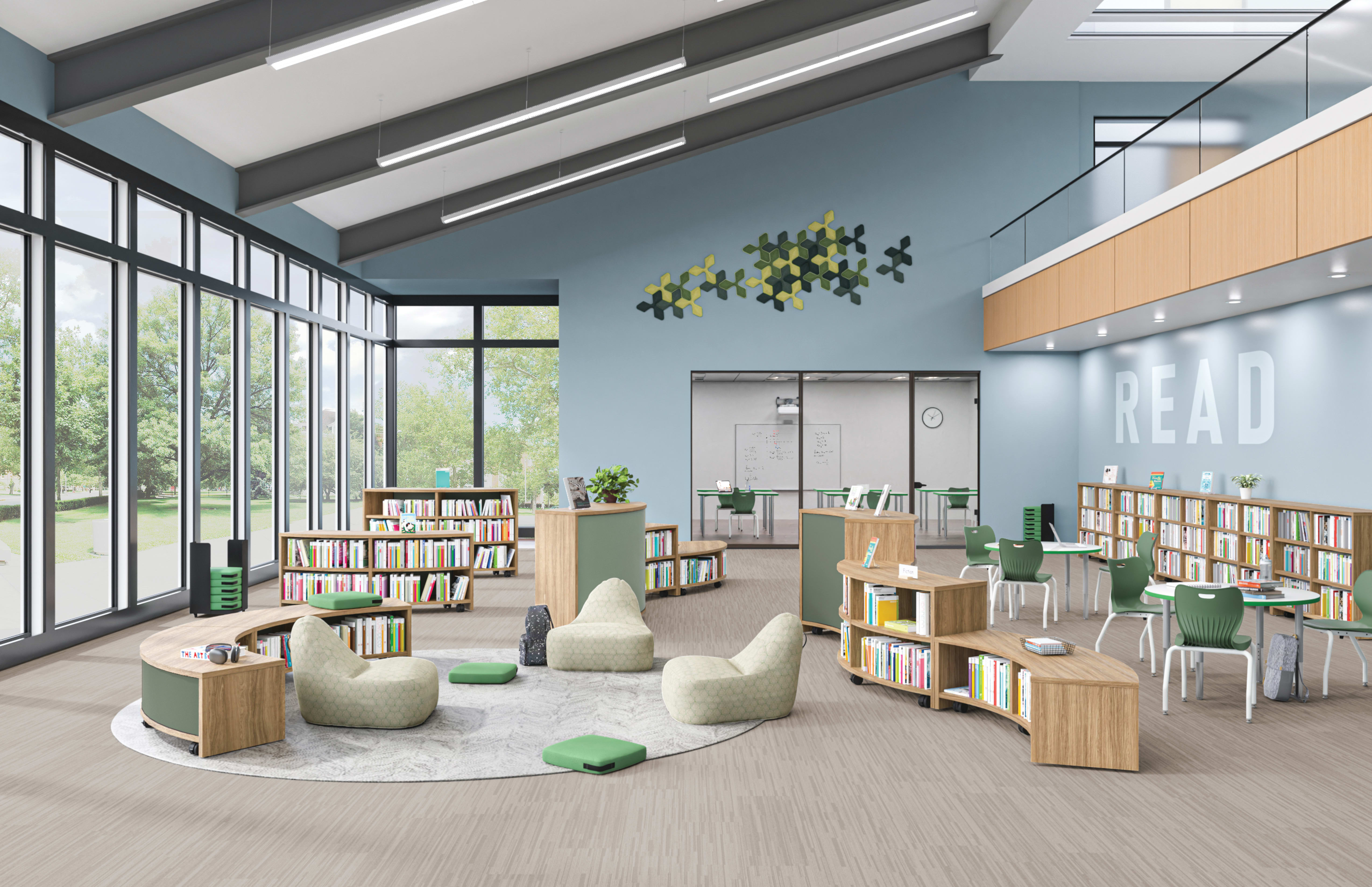 Alt Attribute: School media center with rows of linear and curved Storyline bookcases to create space division for reading or studying.