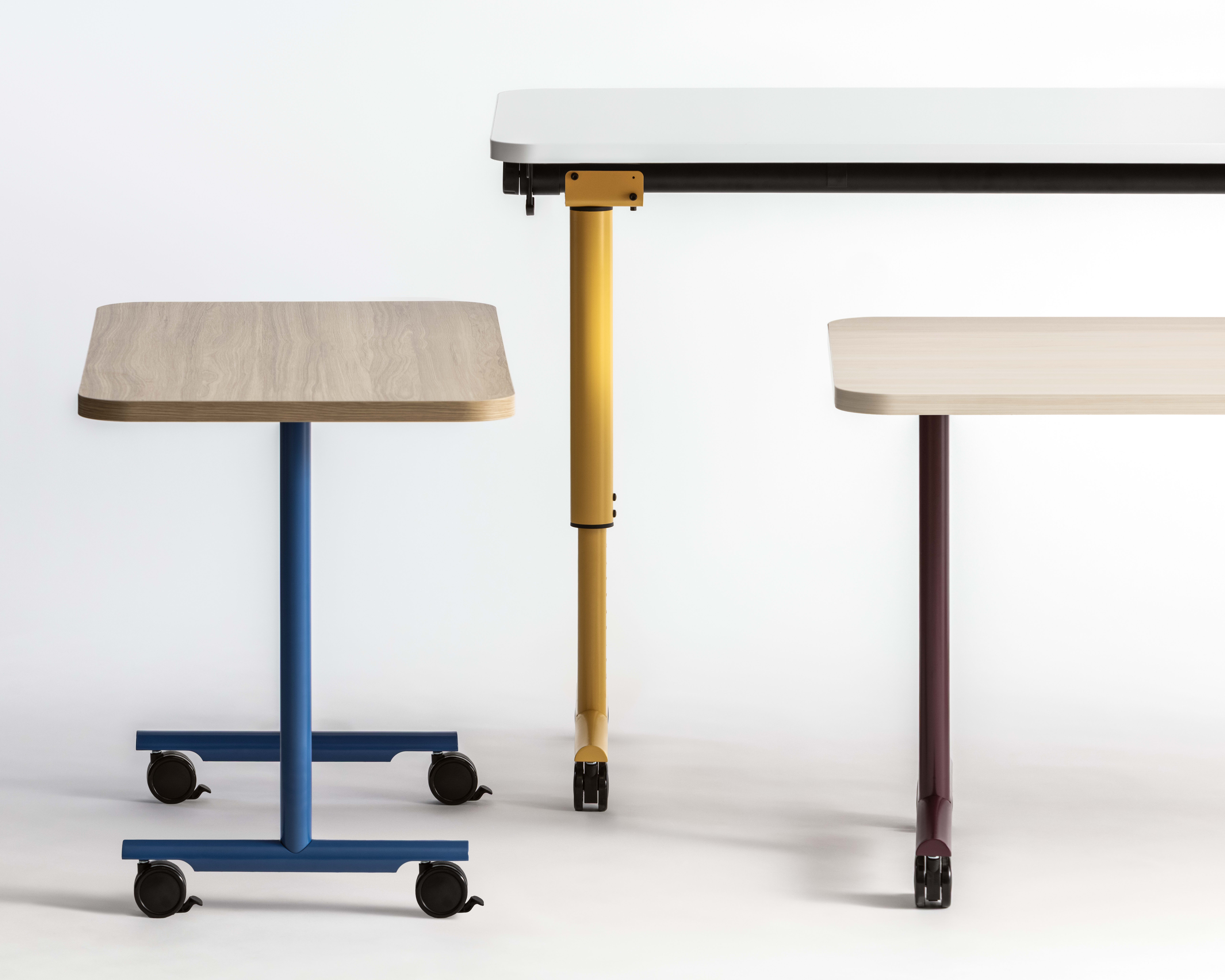 Assorted Field Trip Tables with painted legs.