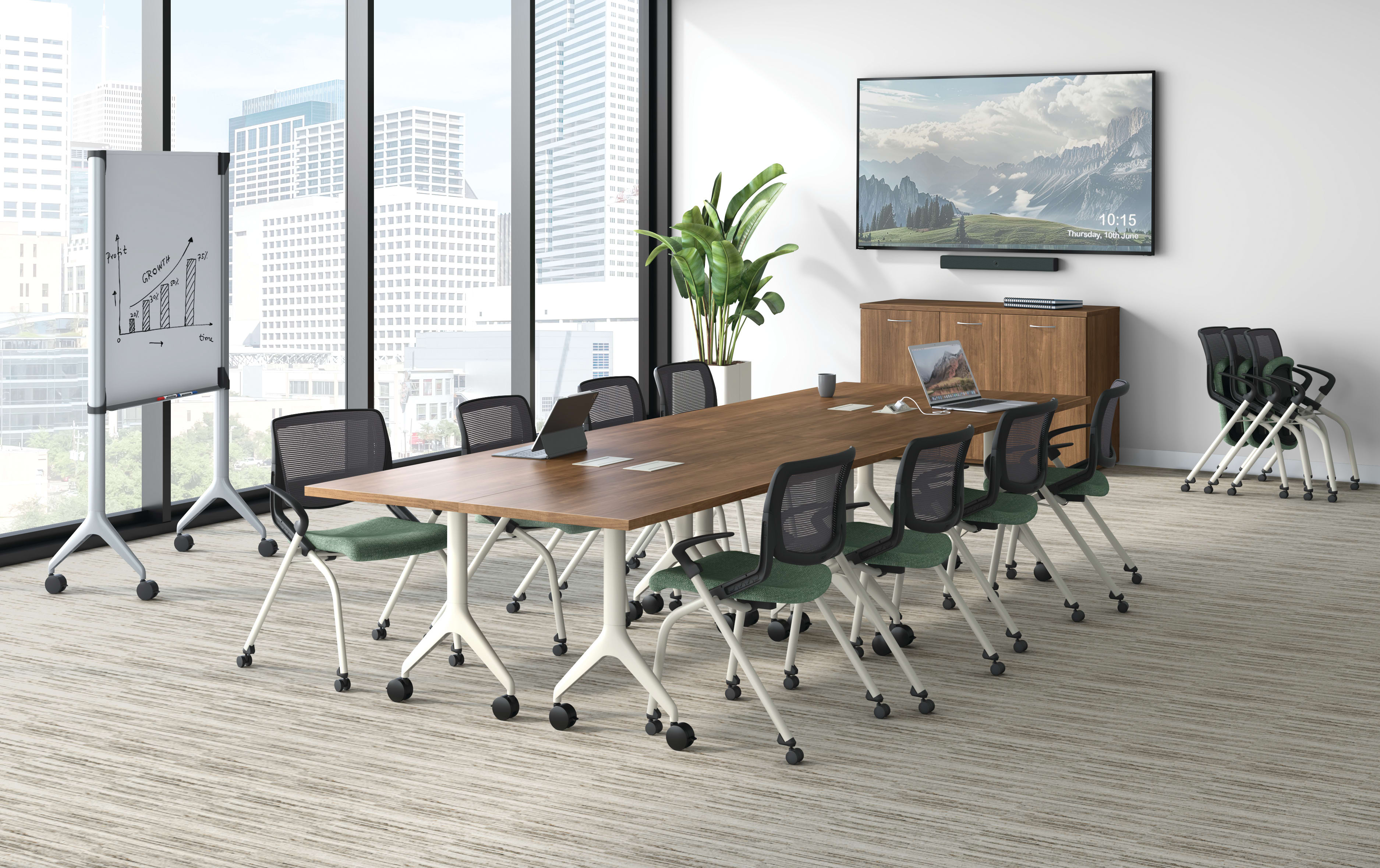 Conference room view of Motivate flex-back chair with Motivate nesting tables
