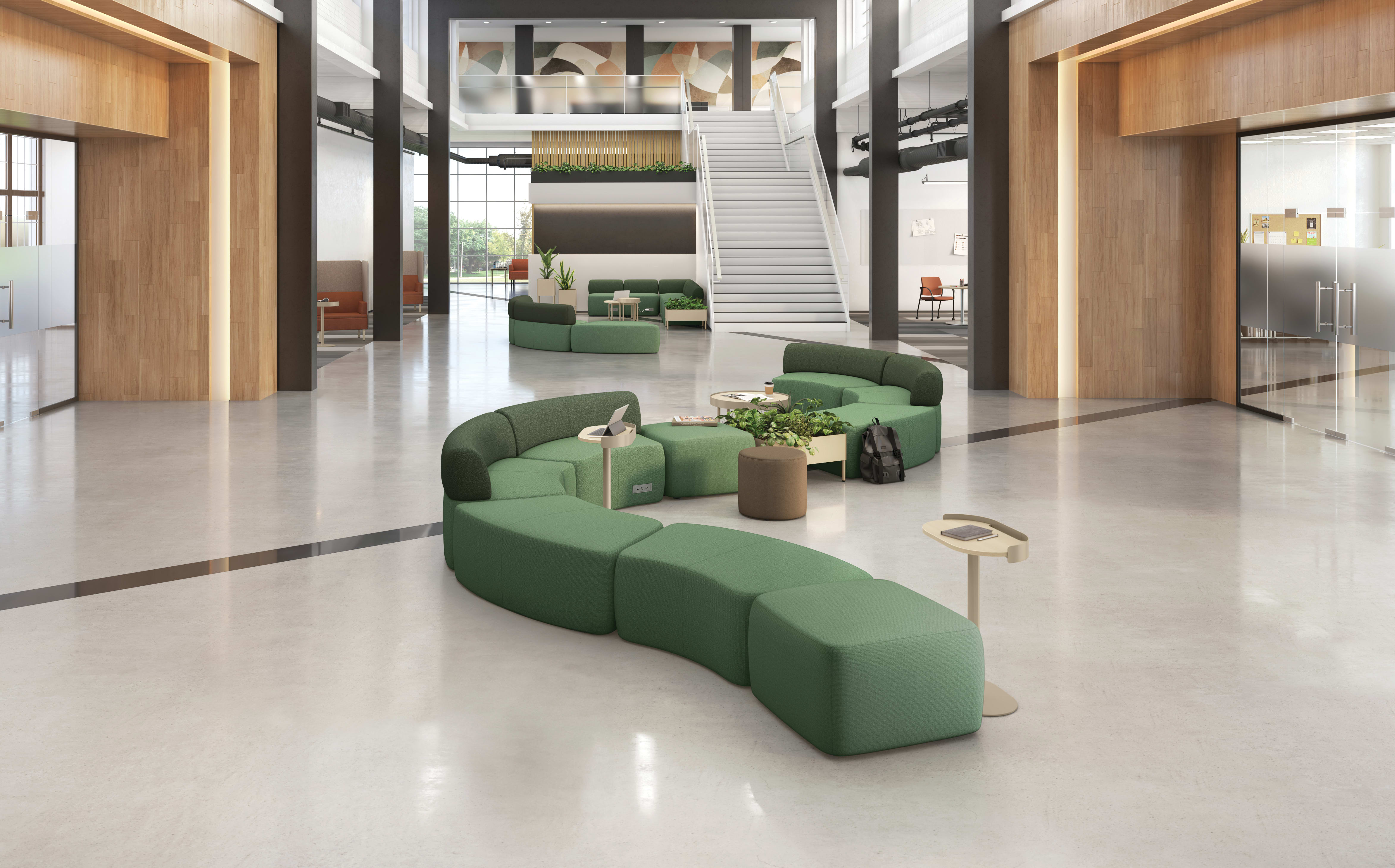 An education administrative setting featuring SoCo lounge seating and Sculpt tables.