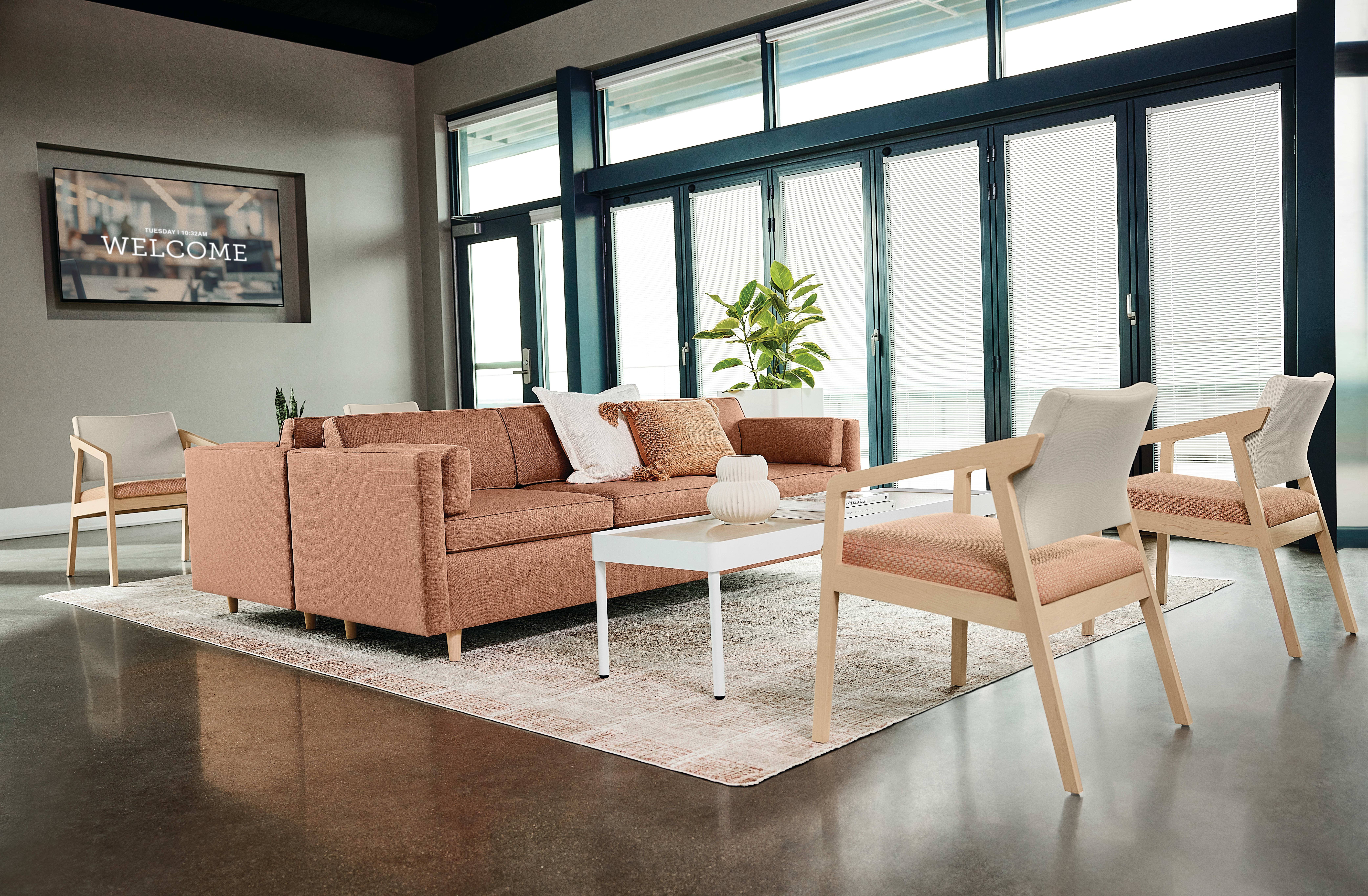 Confer chair with West Hill sofas and Sculpt tables
