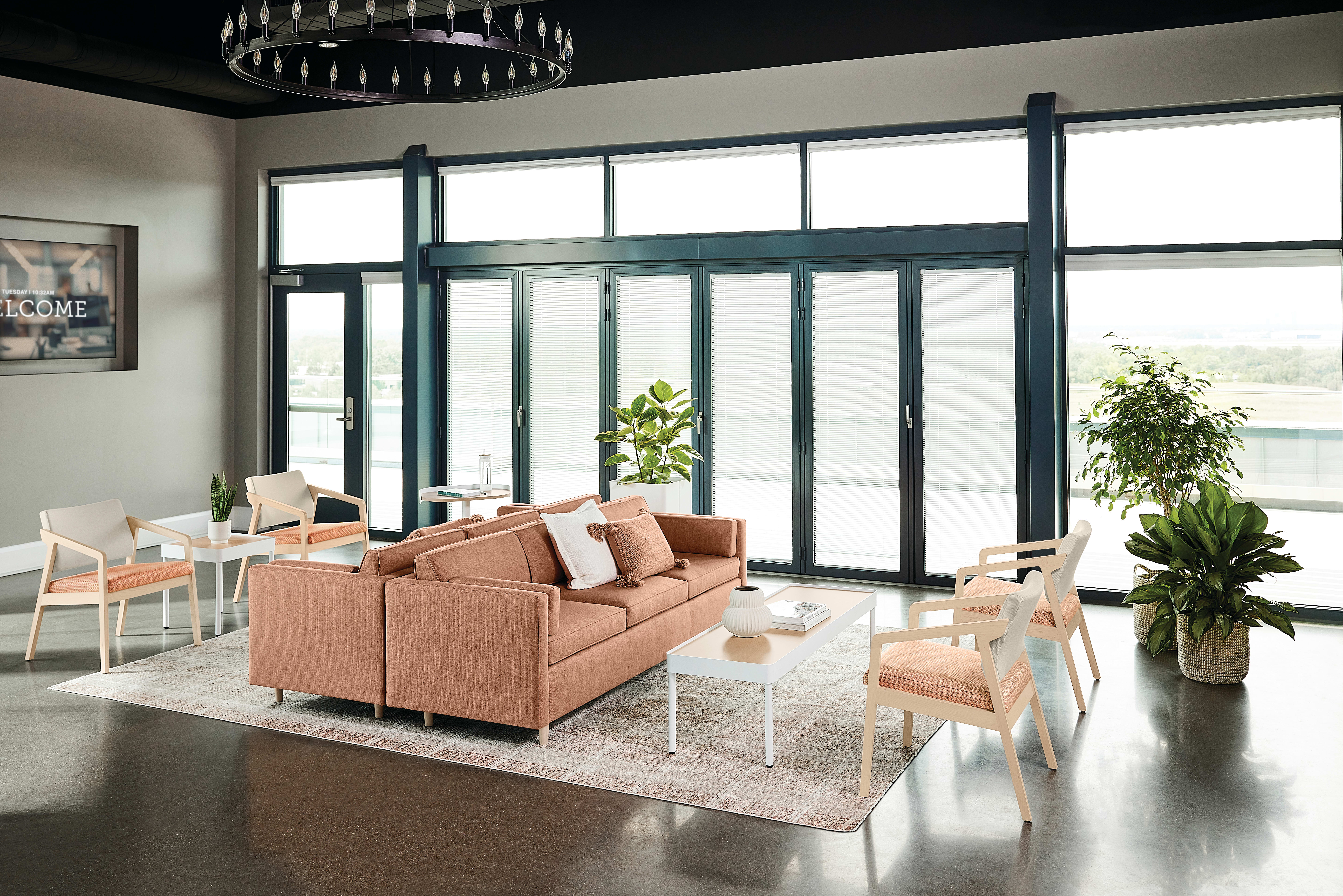 Confer chair with West Hill sofas and Sculpt tables