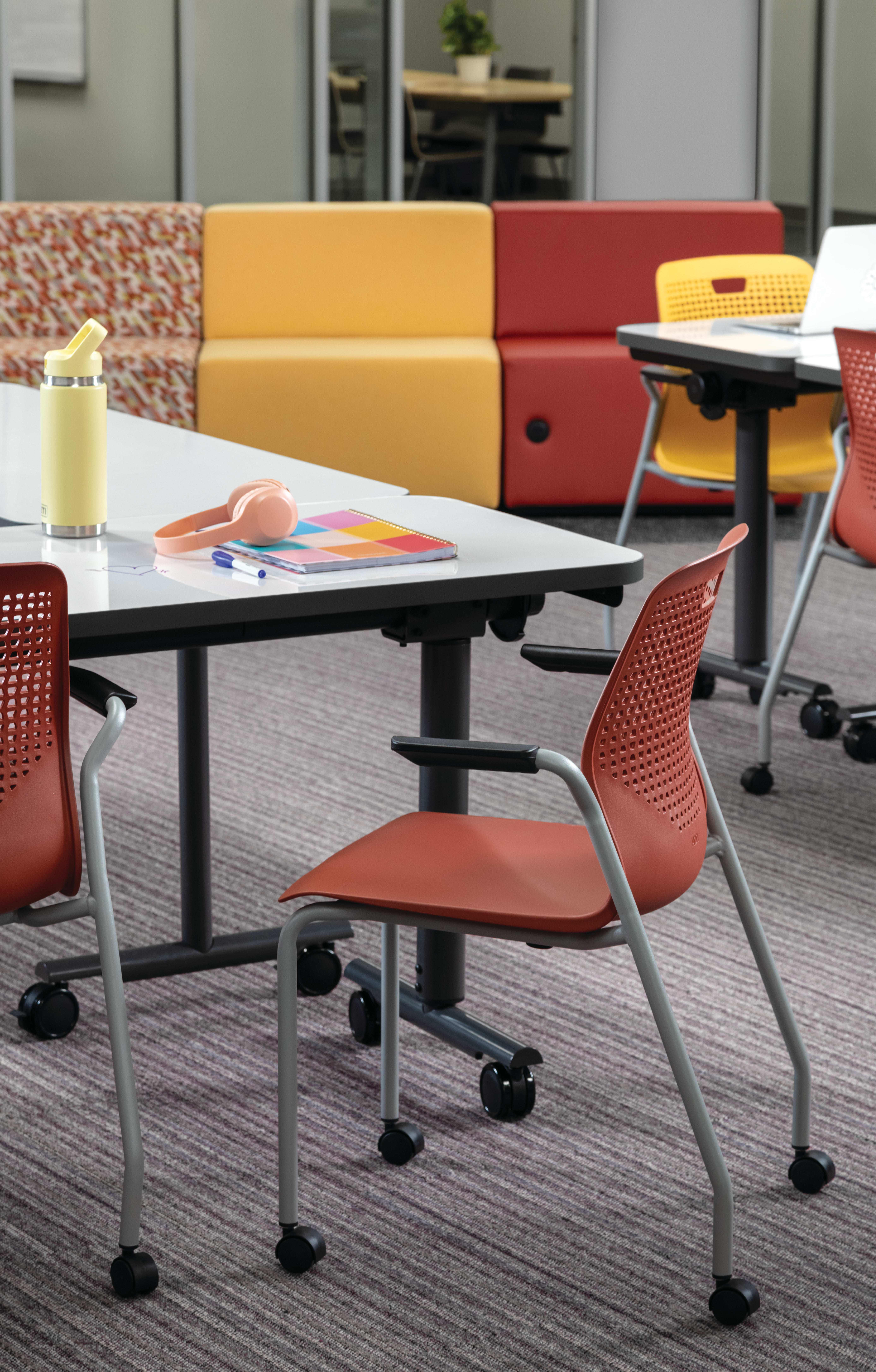 Orange Etch chair at a Field Trip table.
