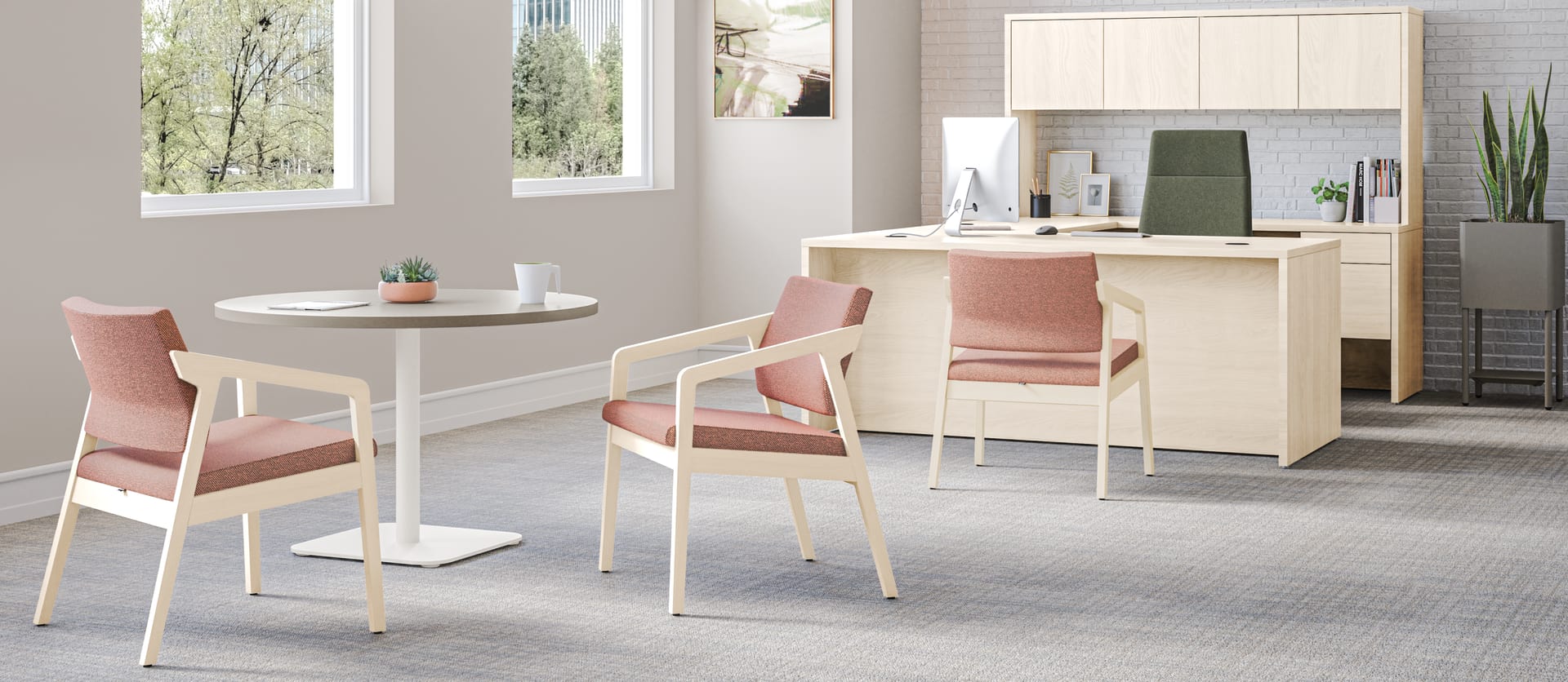 Confer guest chairs with Birk Round Top with Knife Edge and working lounge-height single pedestal.