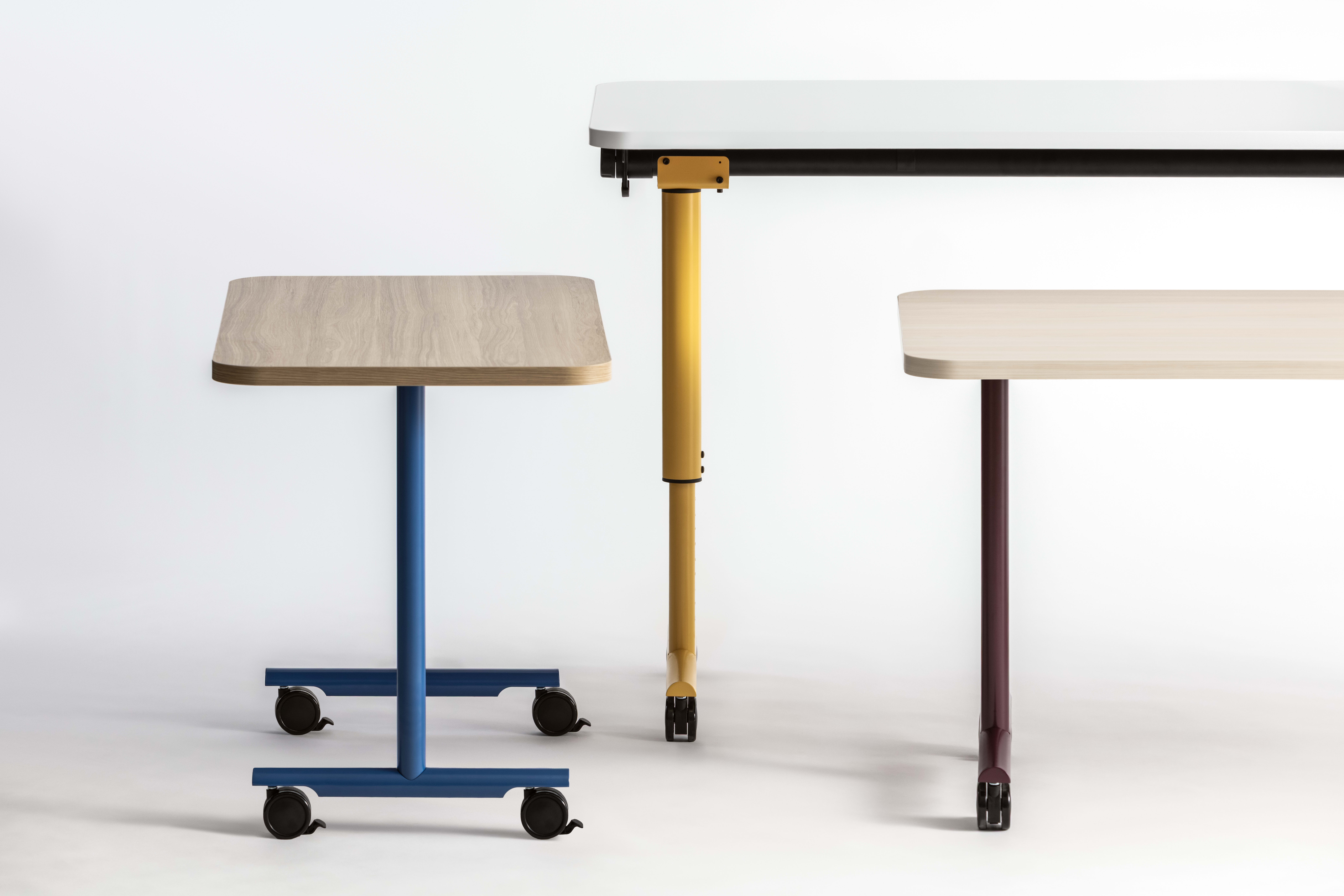 Assorted Field Trip Tables with painted legs.