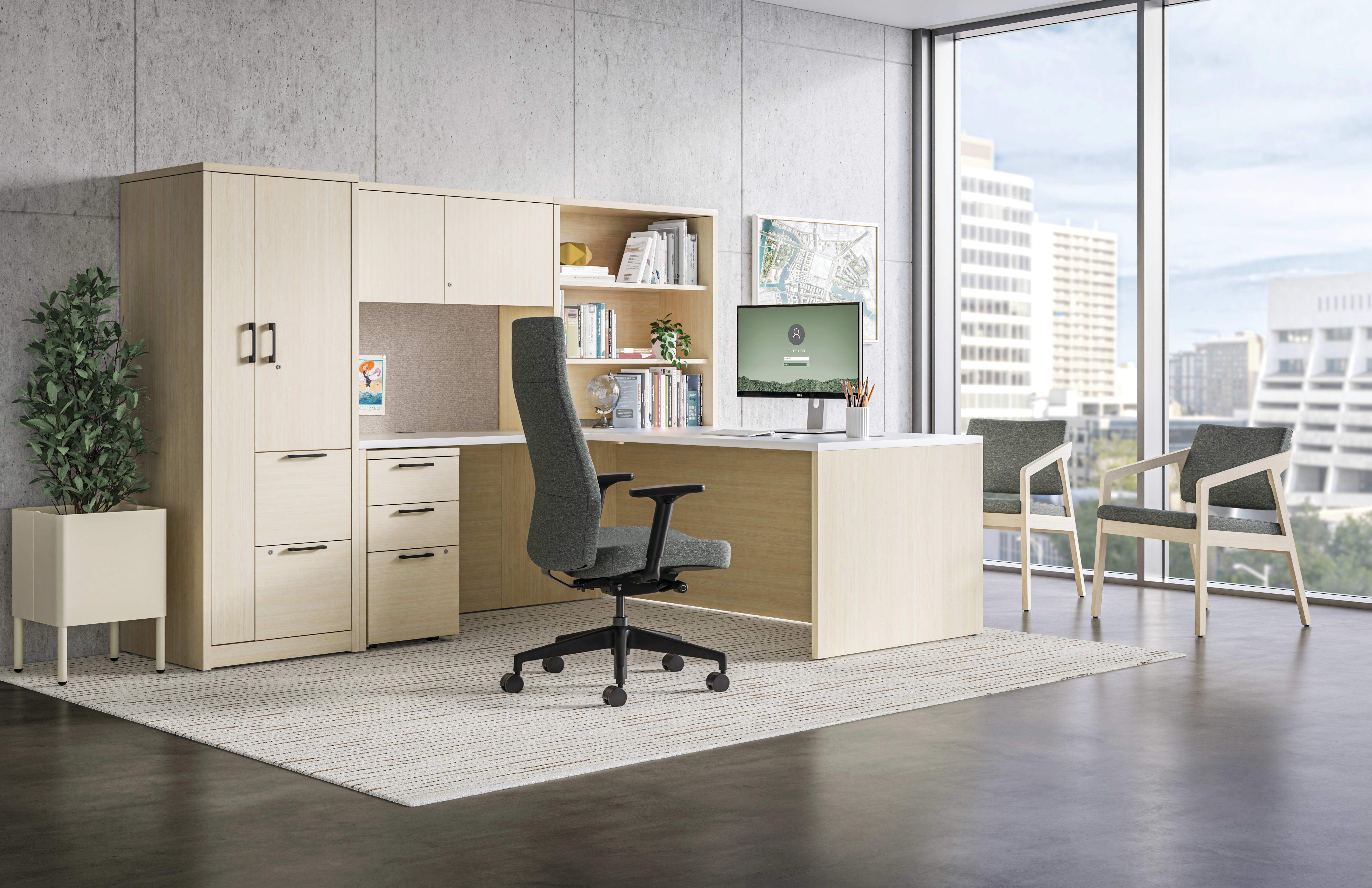 10500 Series traditional executive L-shaped desk with Cofi upholstered high-back chair.