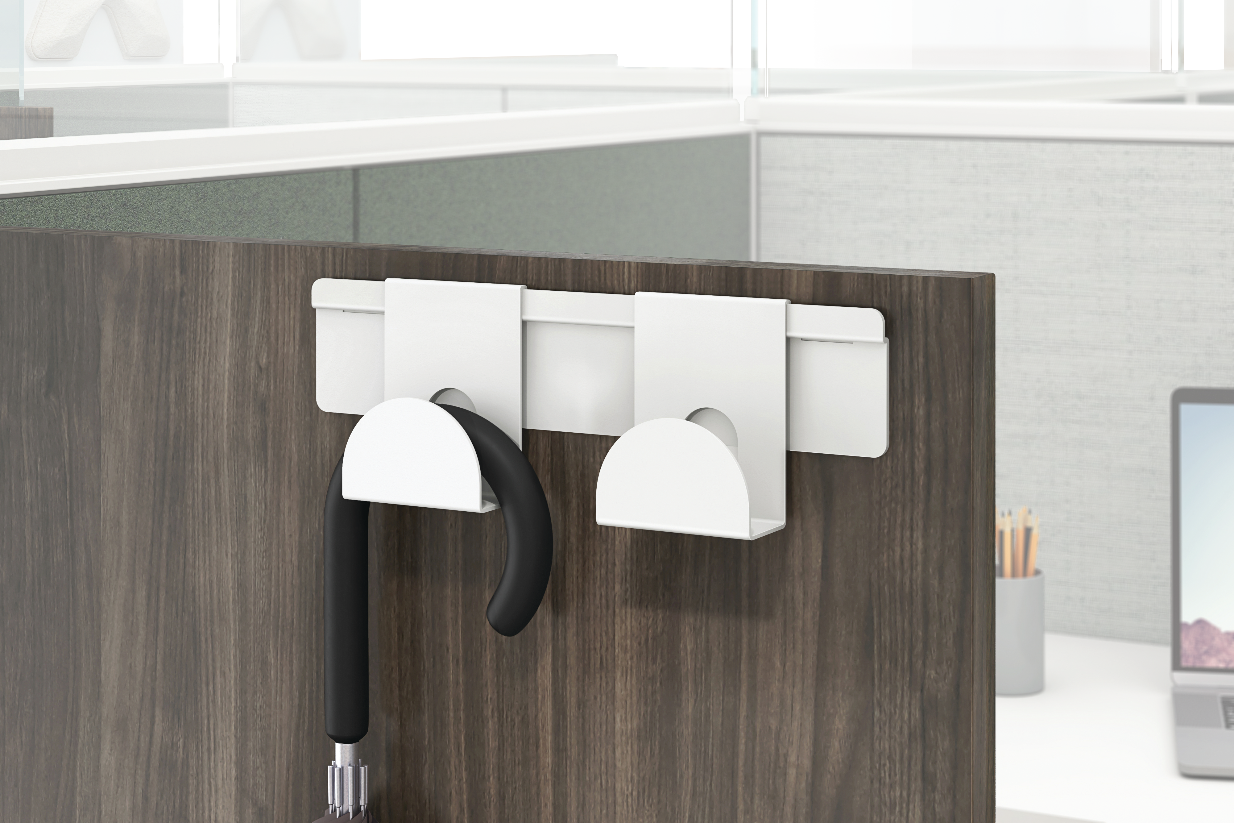 Gallery panel hook holding a hanging umbrella.