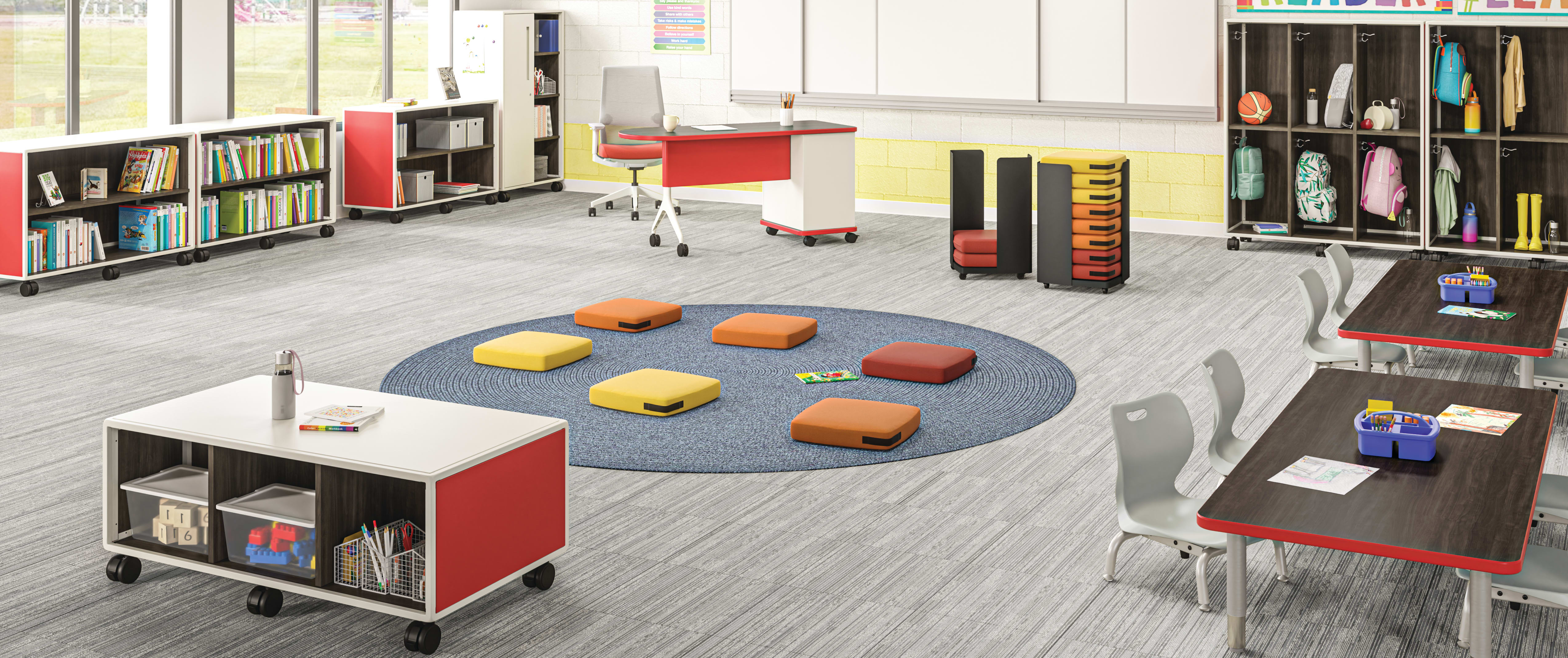 Class-ifi Storage with Confetti Floor Cushions and Storage Cart, Build Tables, Cipher Task Chair, and SmartLink Chairs, Teacher Desk, and Wall Rail System.