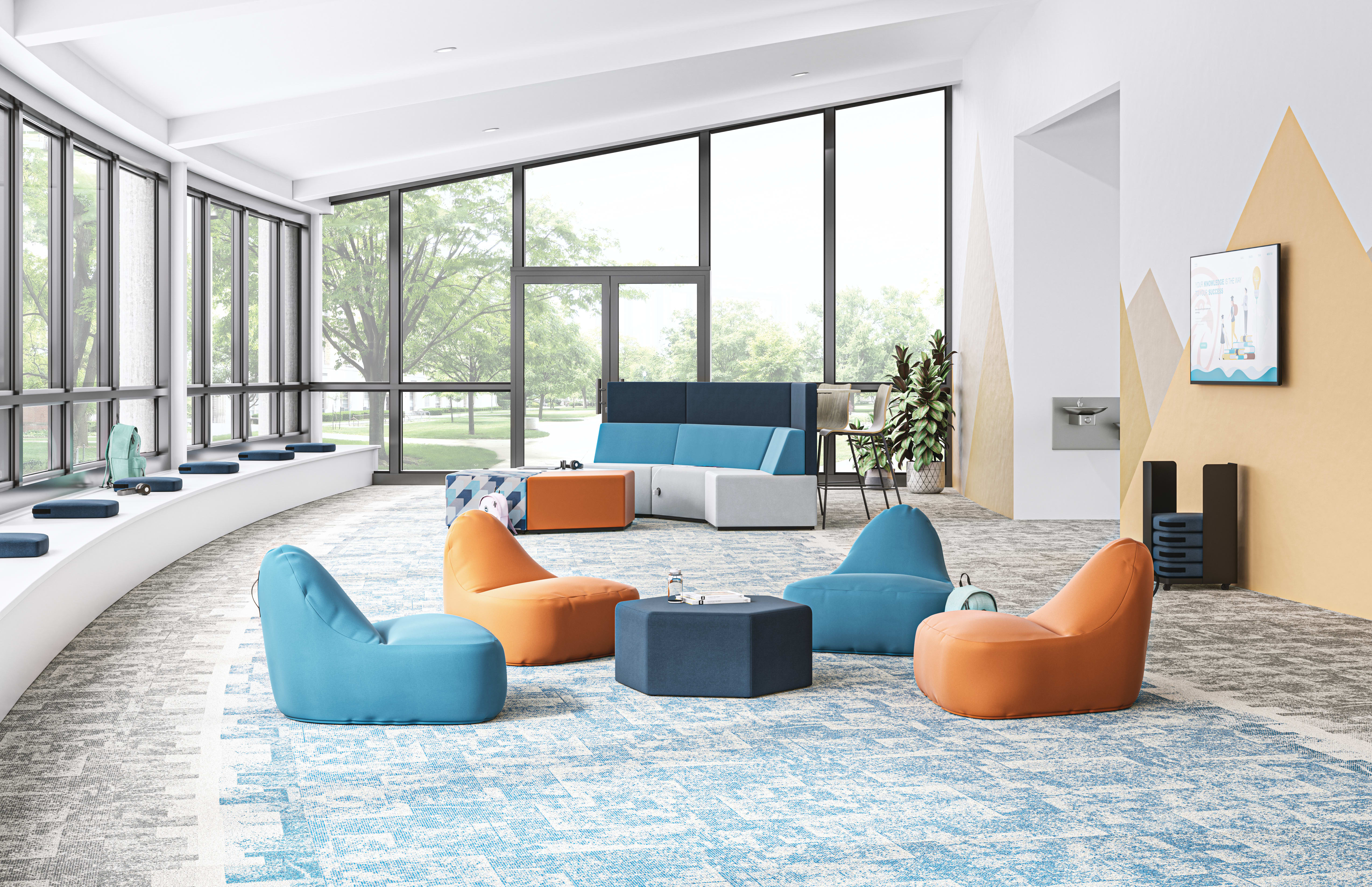 Confetti Floor Lounge and Floor Cushions with Confetti Storage Cart, Ruck Chairs, and Tangram Poufs and Bistro-backs.