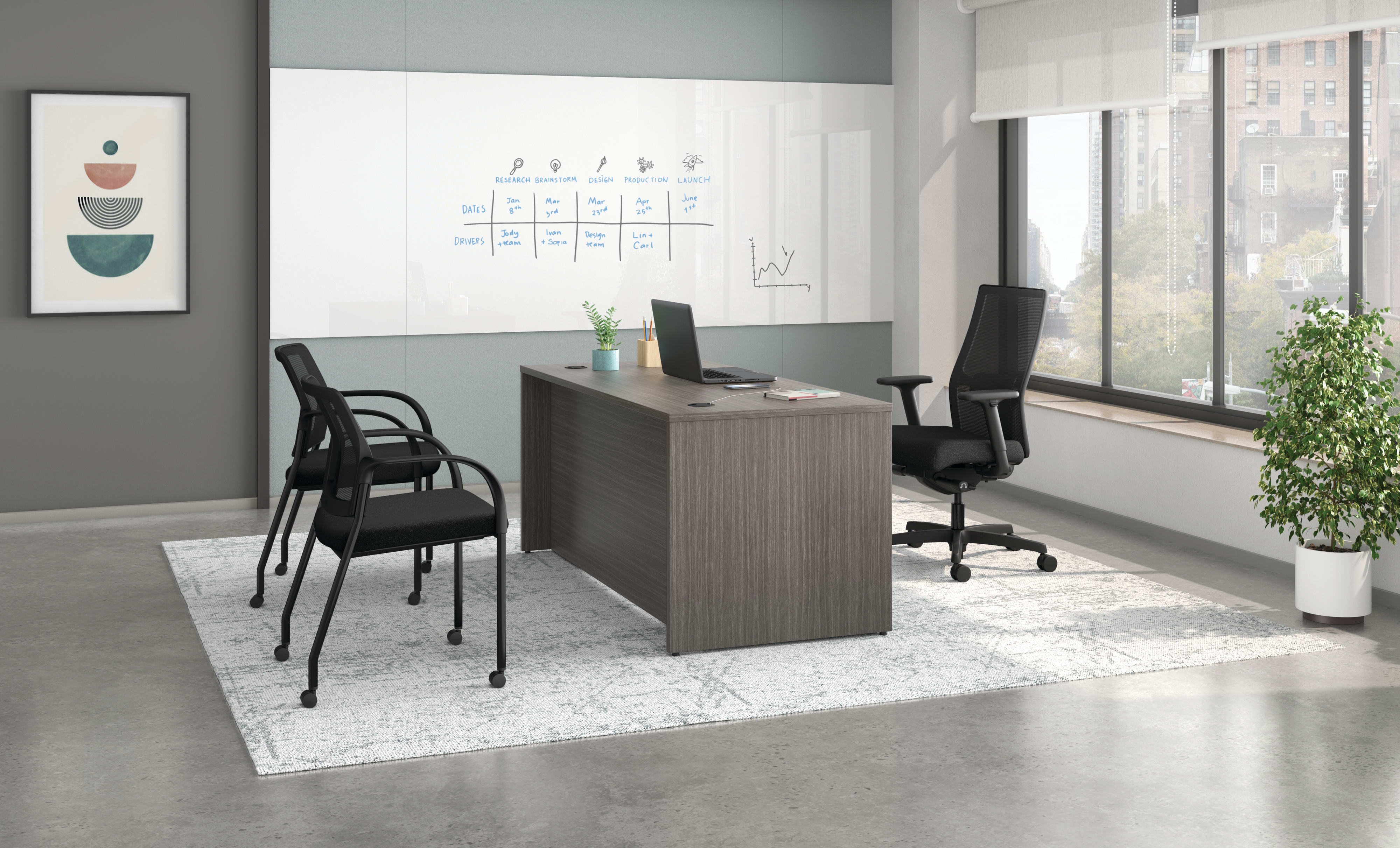 Mod desk with Ignition task and guest seating.