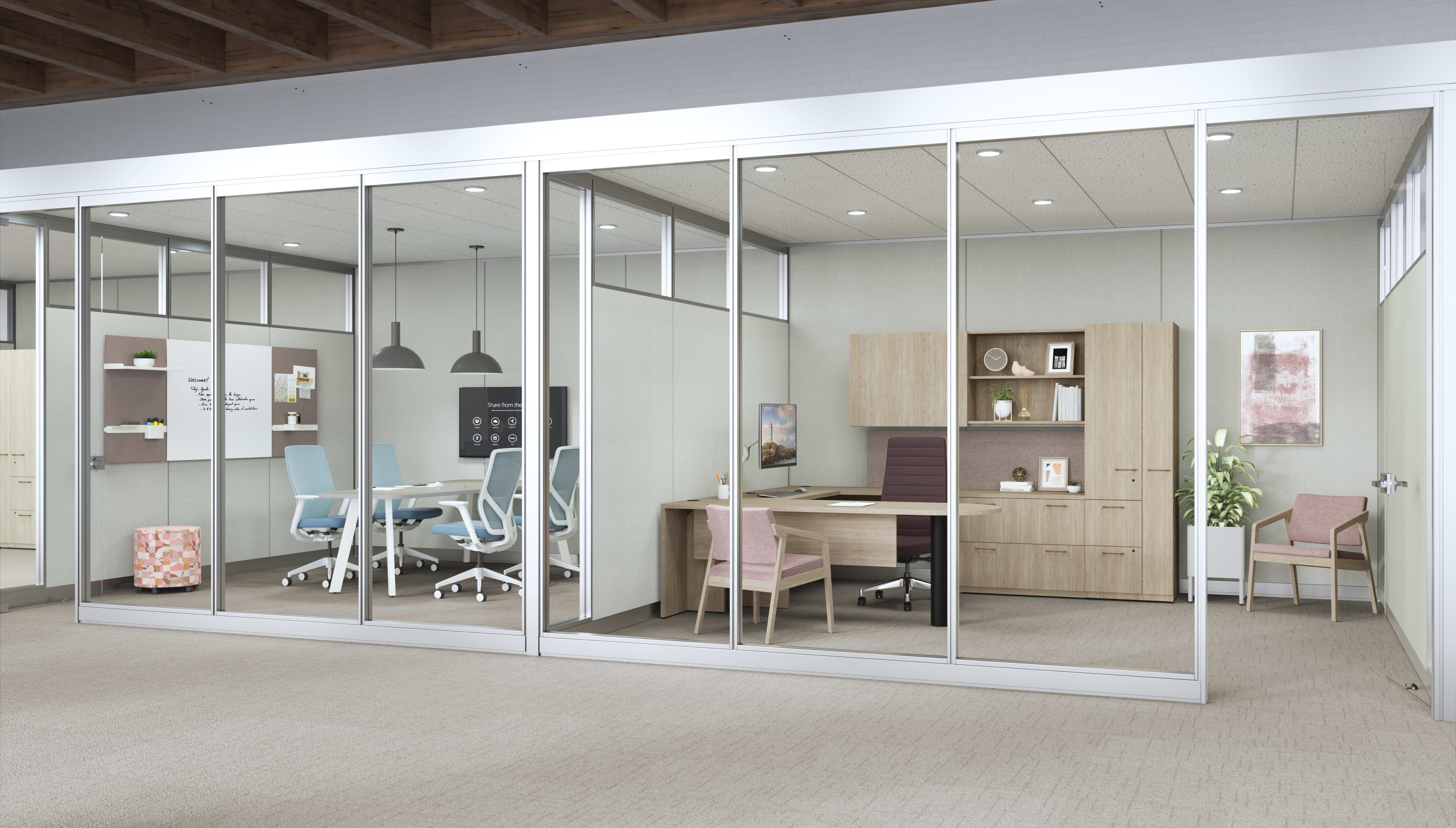 HON executive office featuring Concinnity desk with seating next to a hybrid meeting room. 