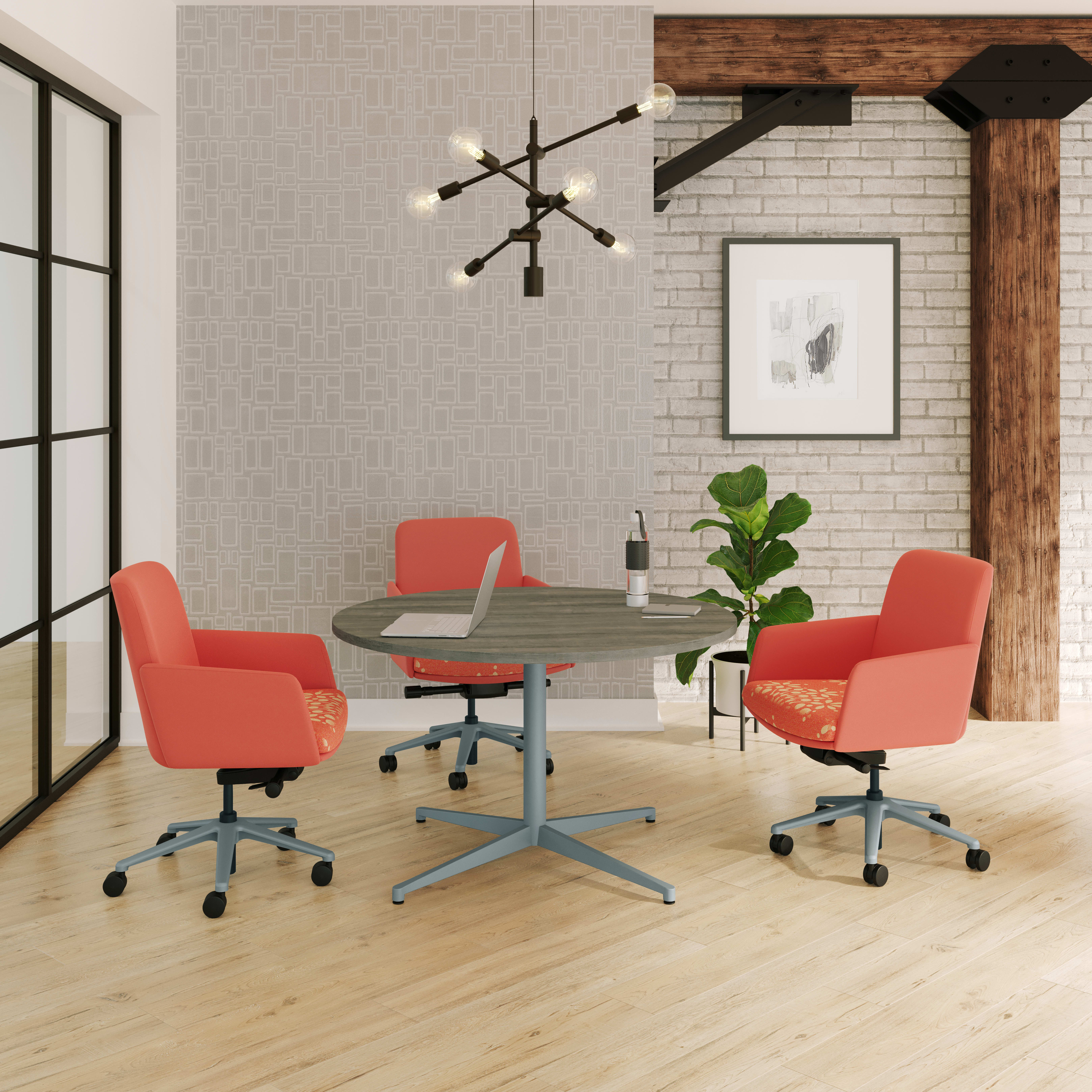 Three Mav mid-back 5-star base chairs around a round Preside table.