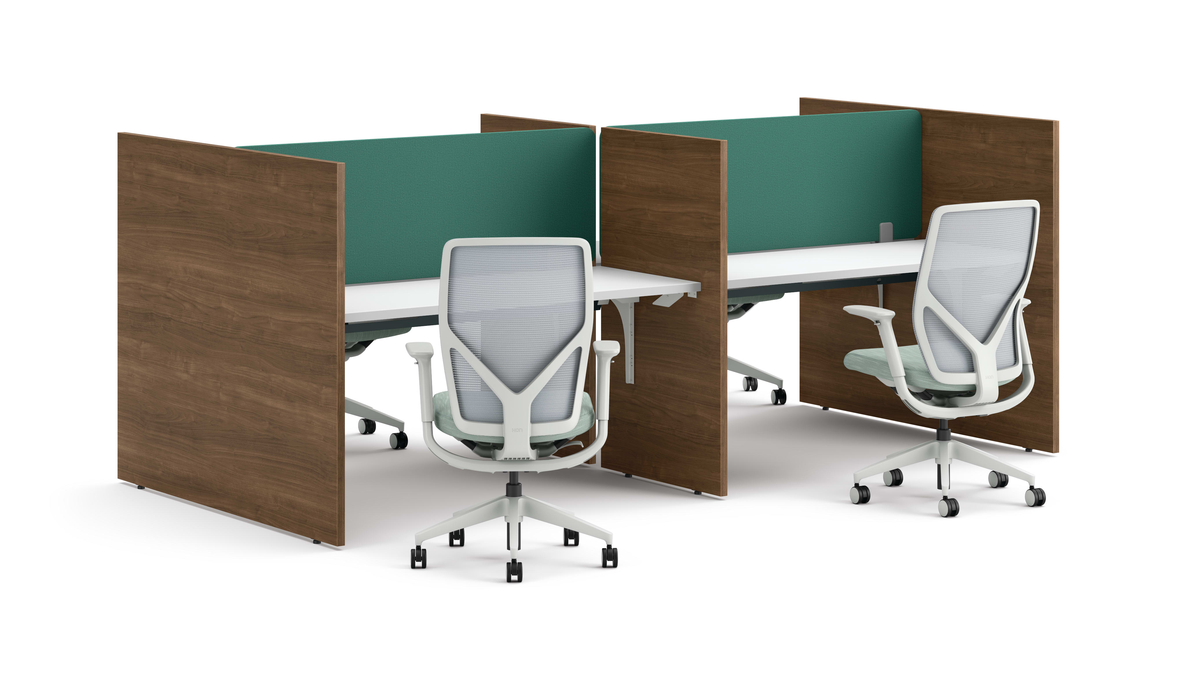 Two workstations with green fabric privacy panels, white desks, and ergonomic office chairs framed by wooden side panels.