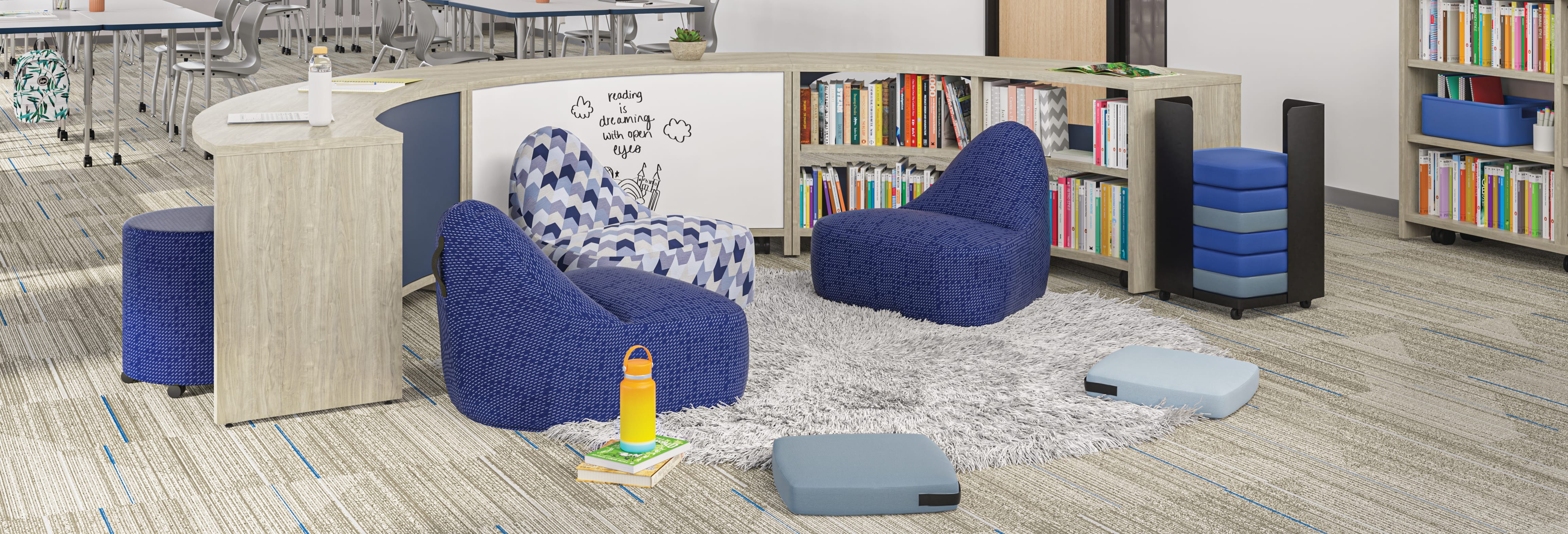 Classroom with Storyline nook featuring Confetti lounge chairs and floor cushions.
