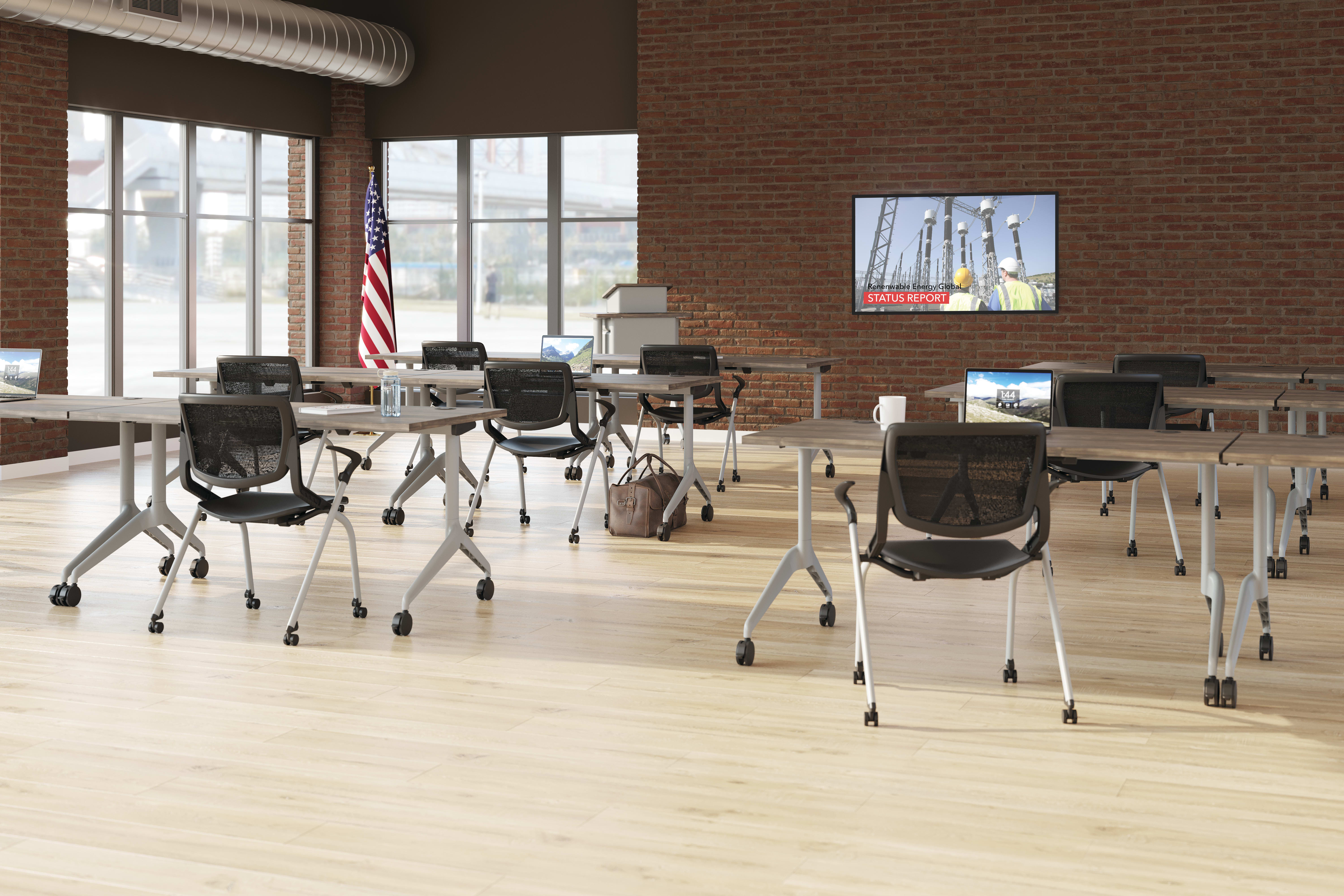 Motivate chairs with Motivate training tables.