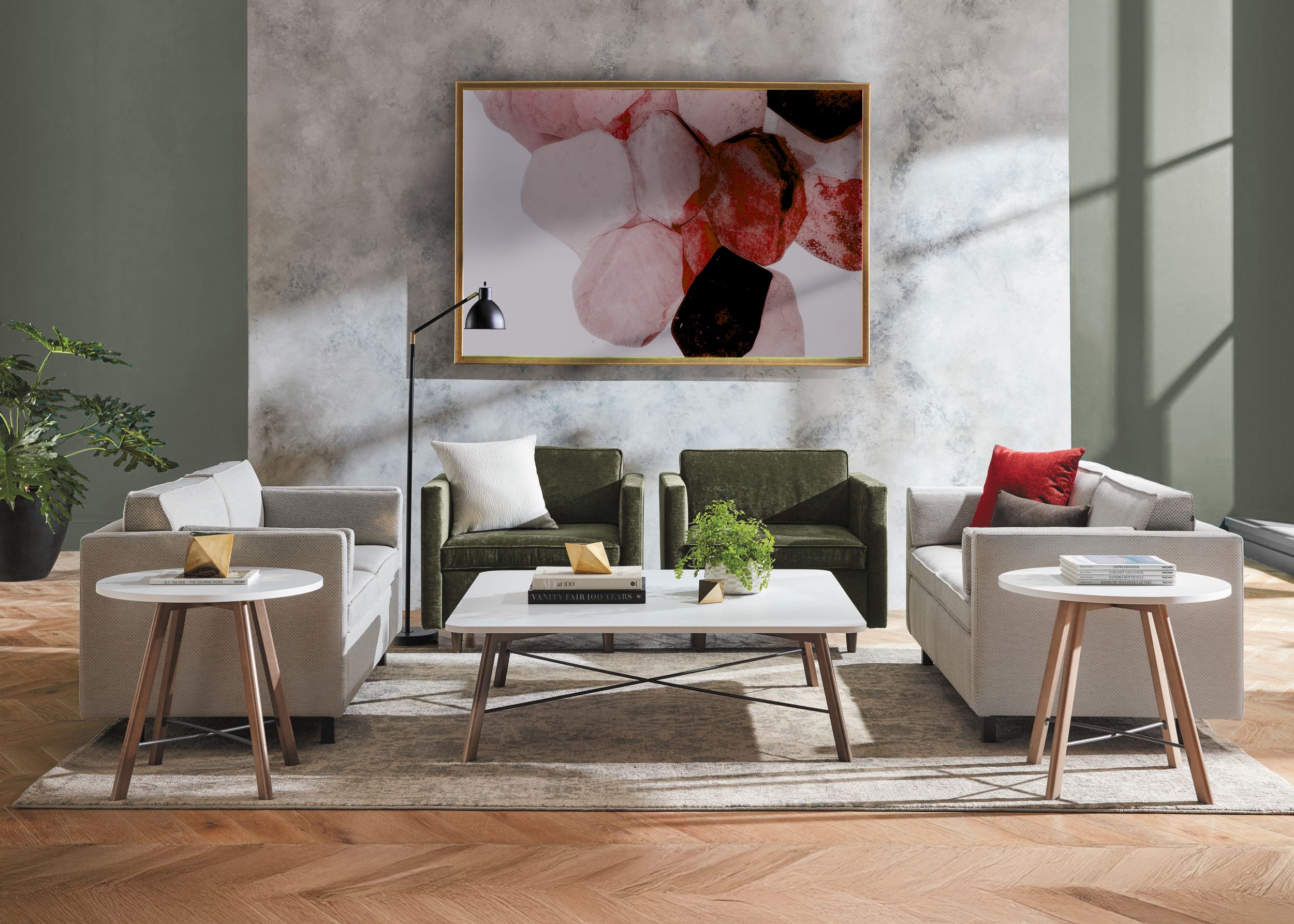 A modern and minimalist living room with plush green sofas, a white coffee table, and a large abstract artwork on the wall, set against a marble-like background.