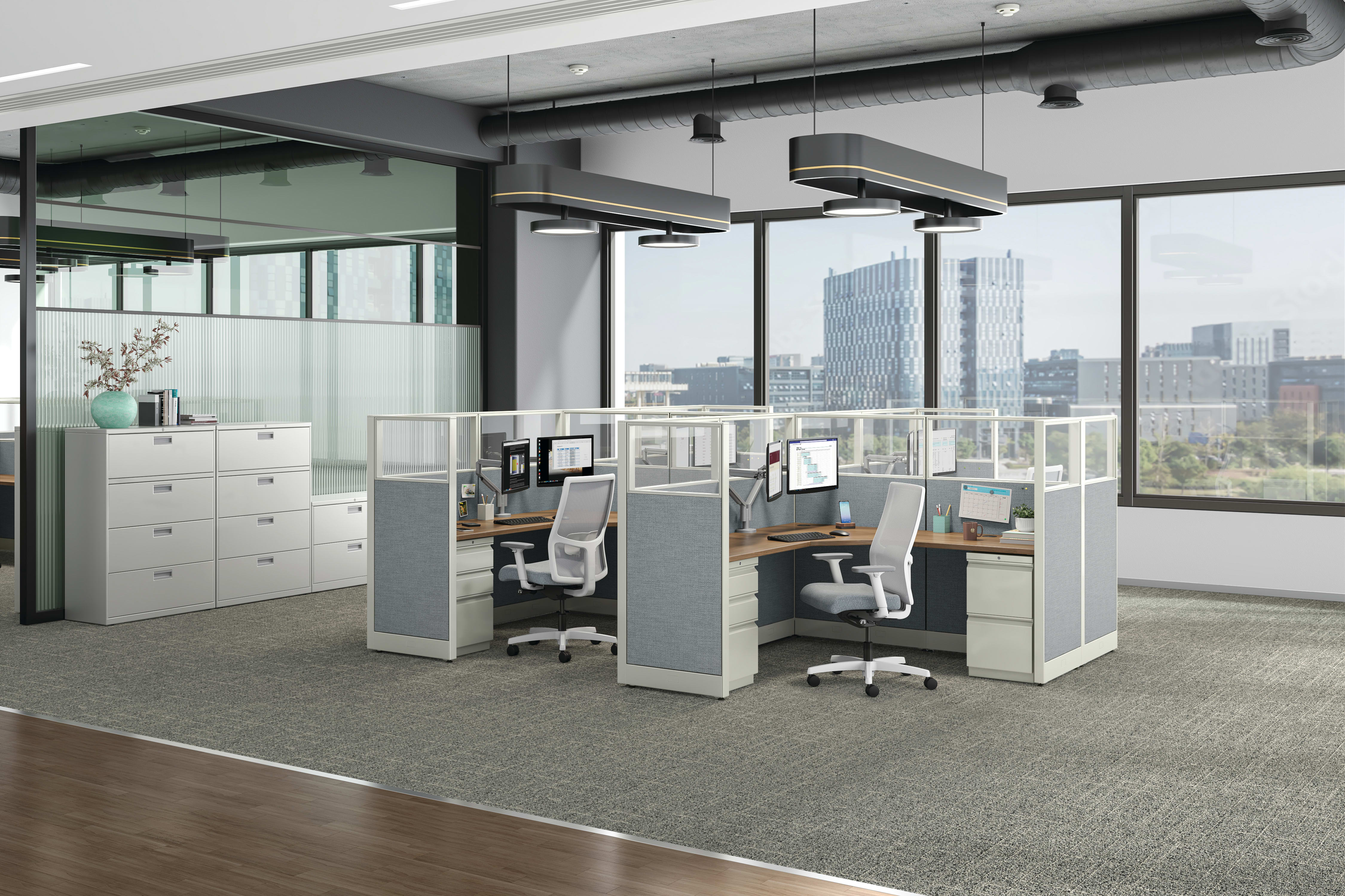 Accelerate workstations shown with Ignition task chairs and Brigade storage.