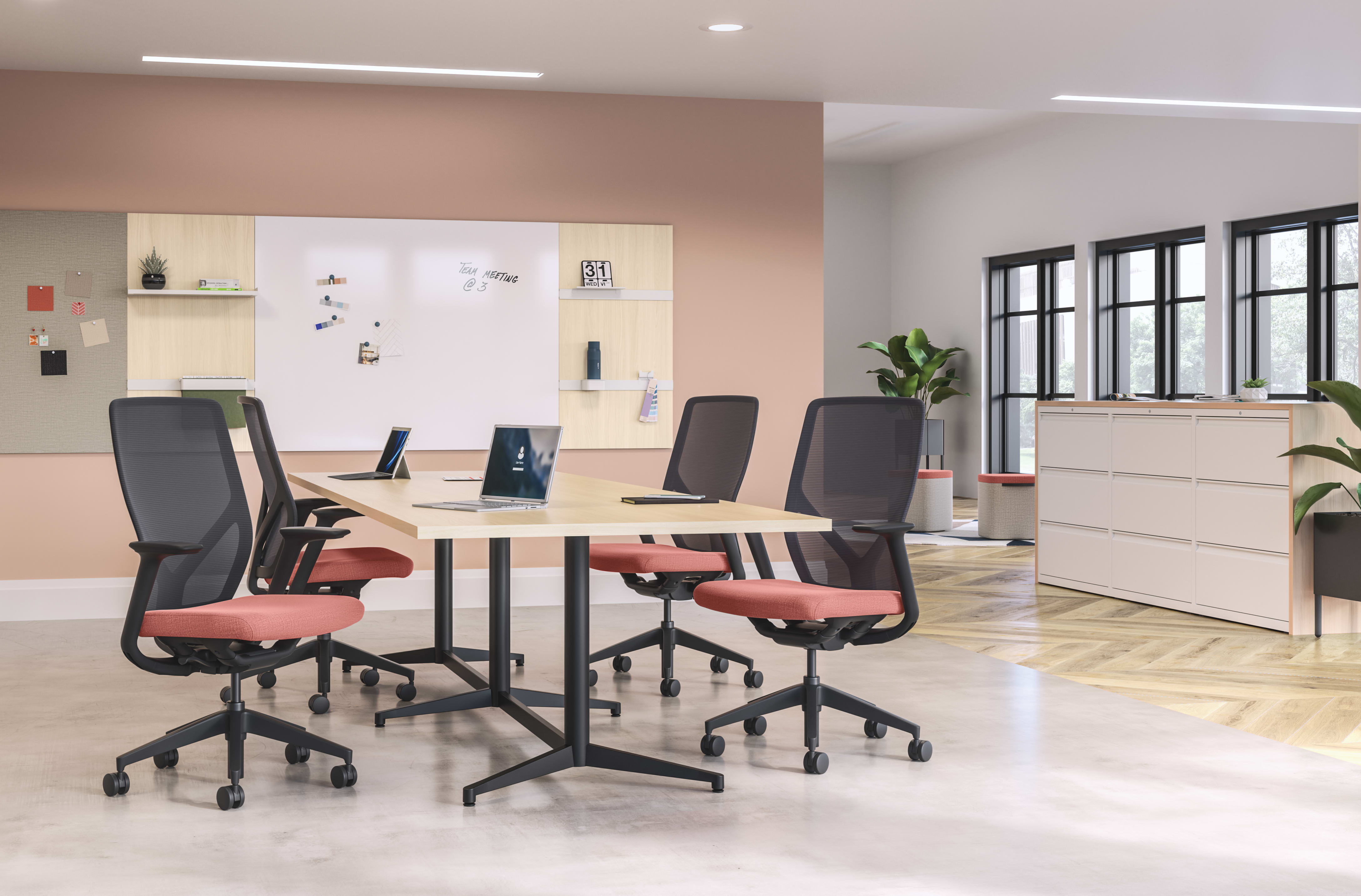 Preside conference table with Flexion task chairs and Workwall markerboard tile, fabric tile and laminate tiles.