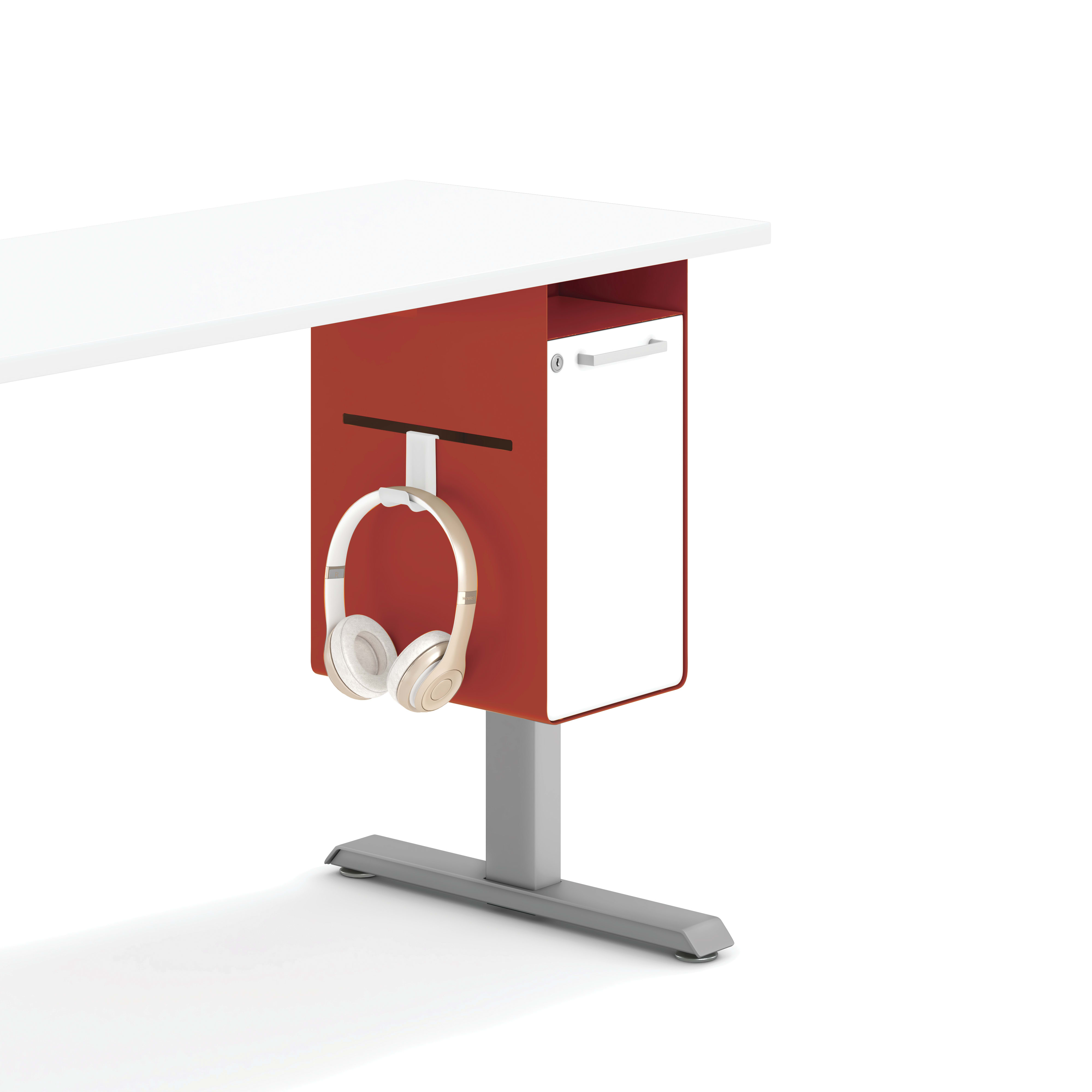 A red rectangular object with a white headphone attached to it, standing on a gray surface against a plain white background.