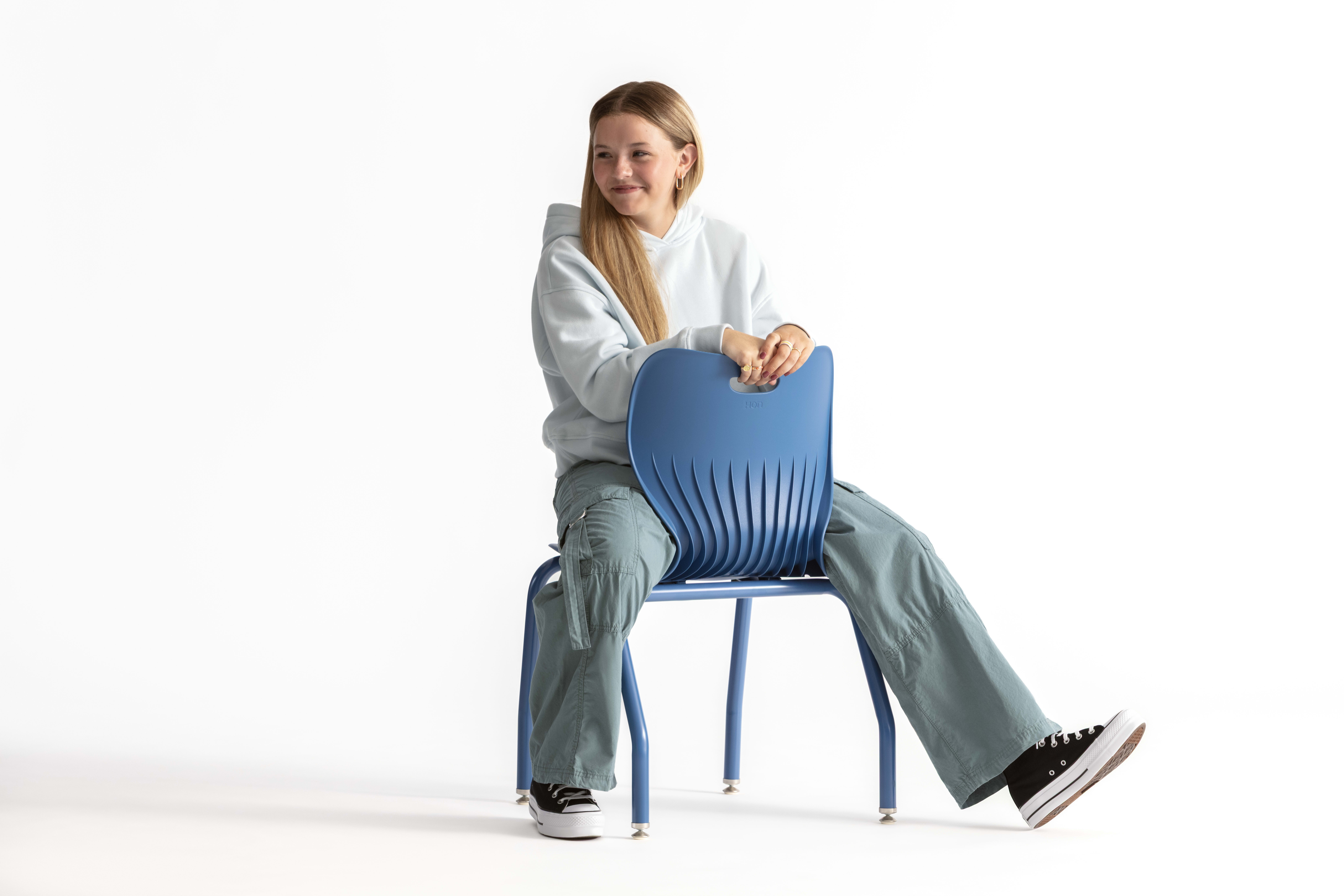 One seated student on a blue monotone Smartlink chair.