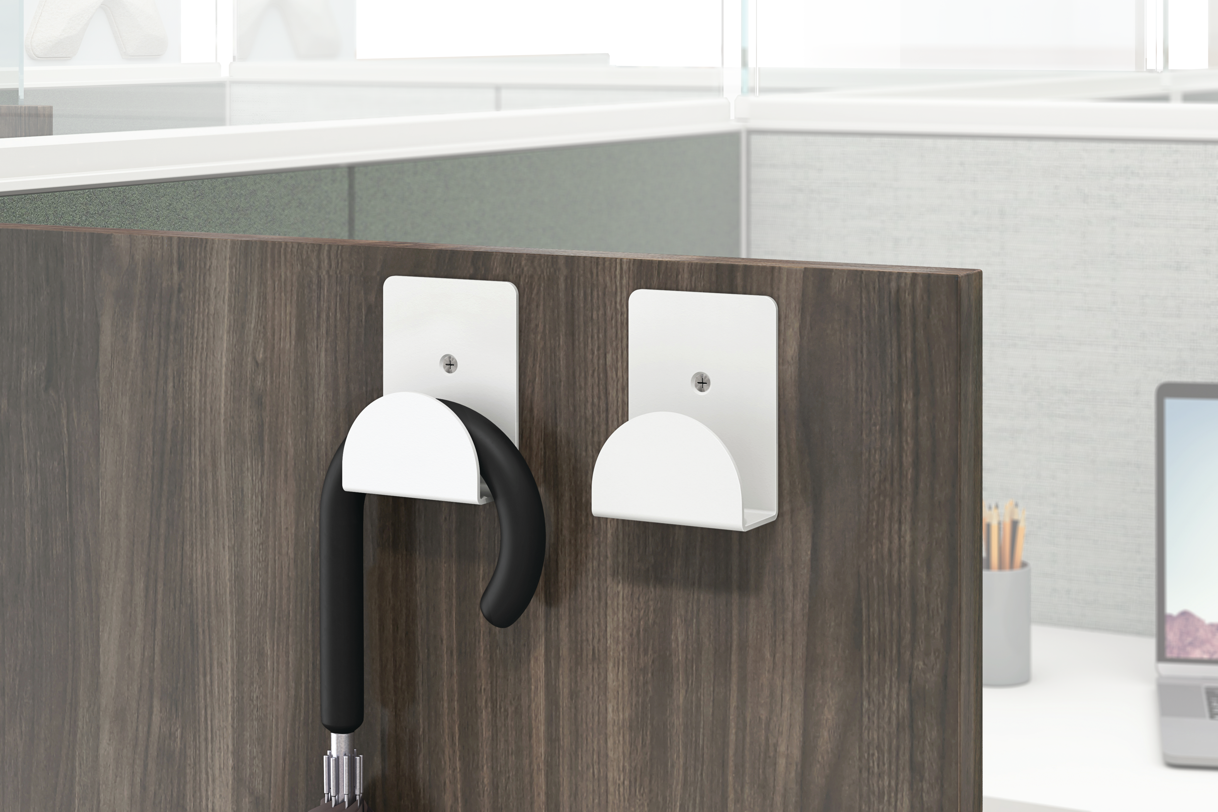 Gallery panel hook holding a hanging umbrella.