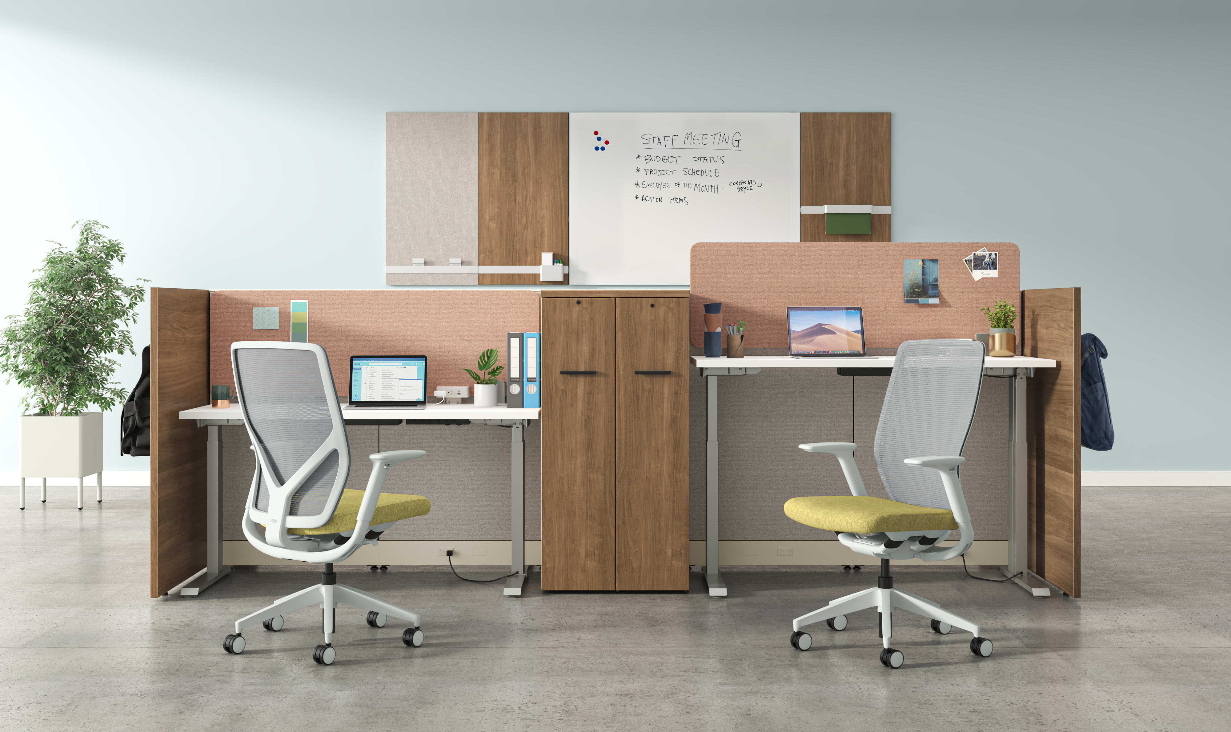 A modern and minimalist office space with desks, chairs, and various office supplies and decor elements.
