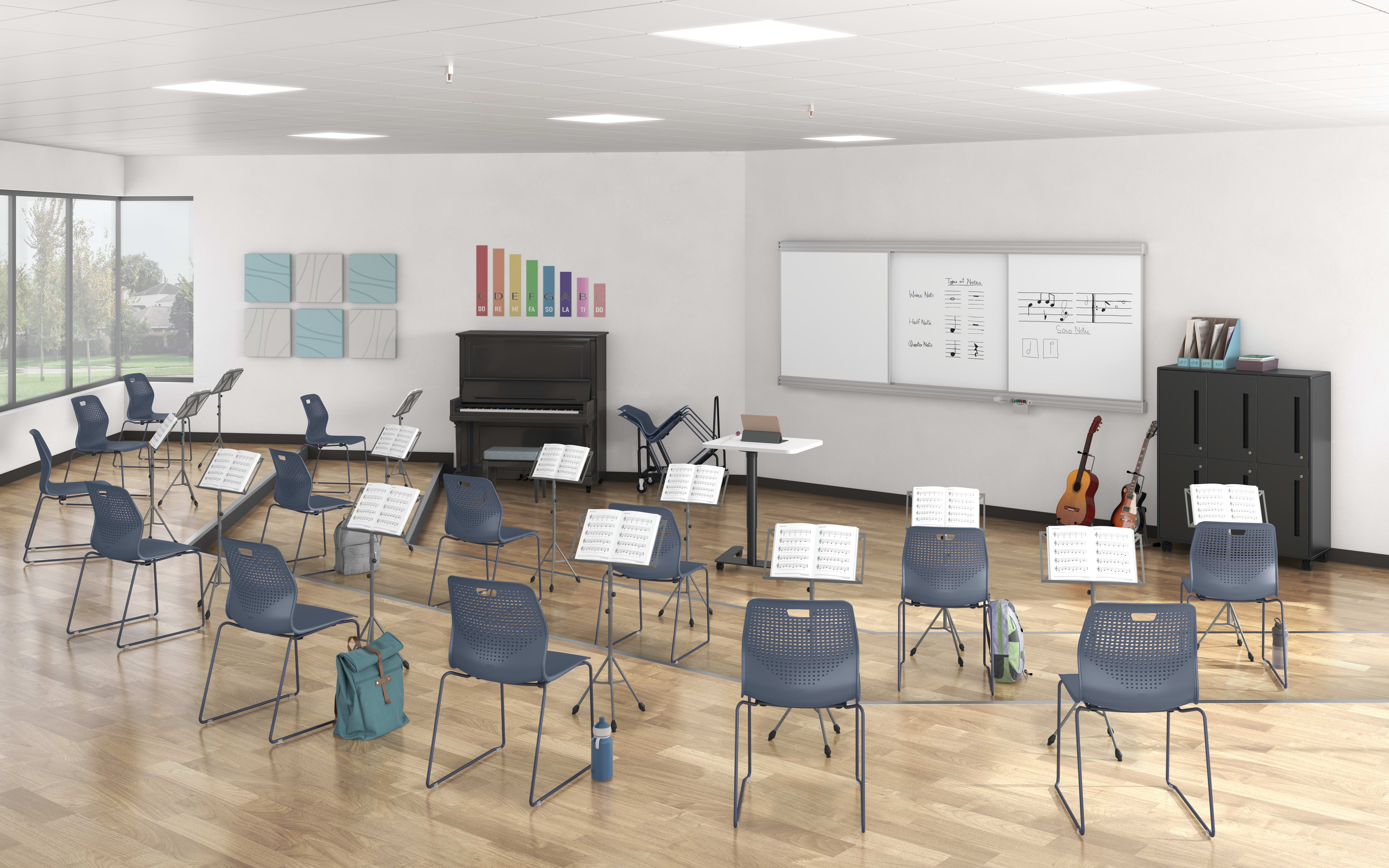 School music room with blue Etch wire frame chairs and a Roll Call teacher's lectern.