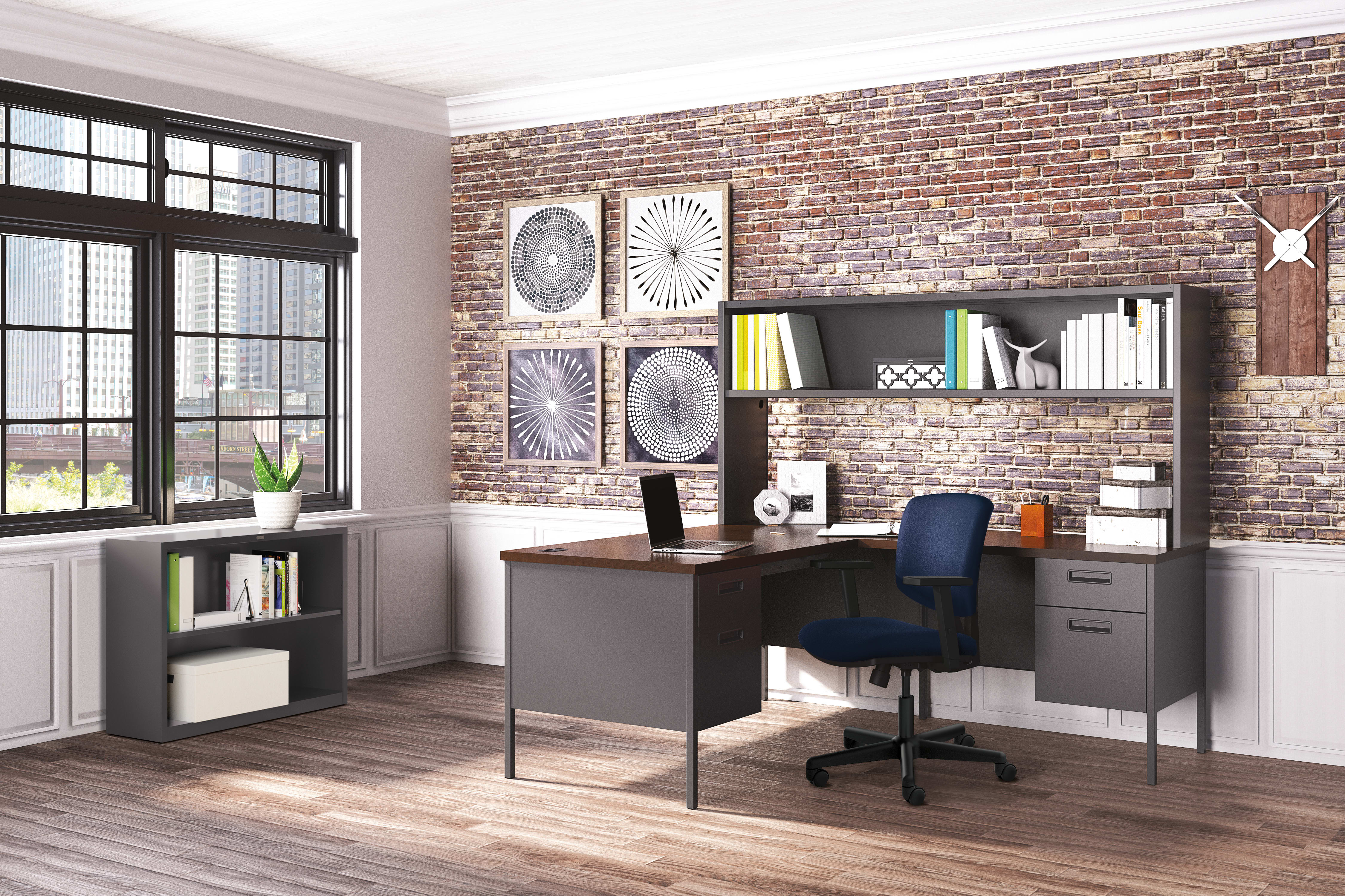 A modern and stylish home office with a brick wall, bookshelves, a desk, and various decorative elements.