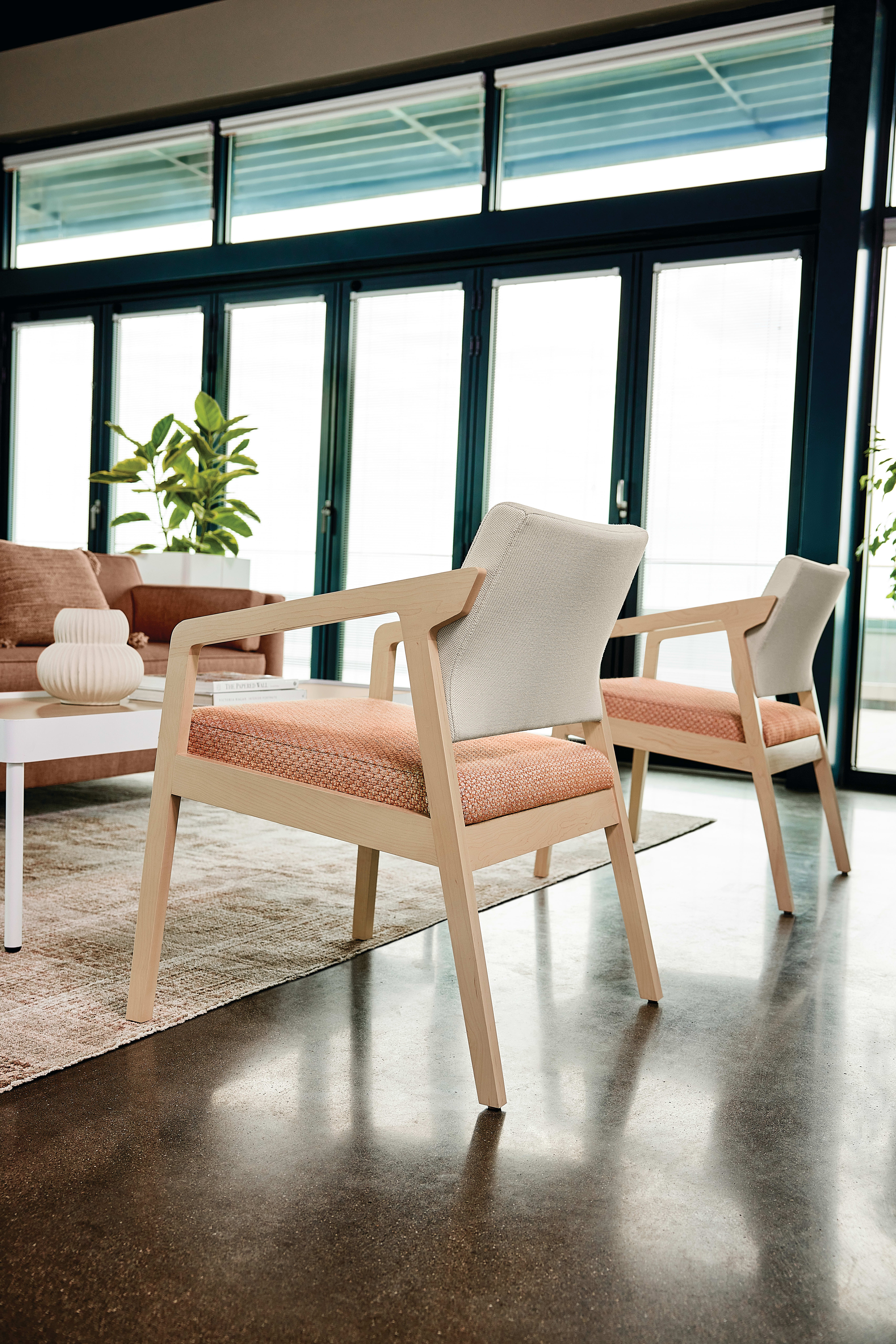 Confer chair with West Hill sofas and Sculpt tables