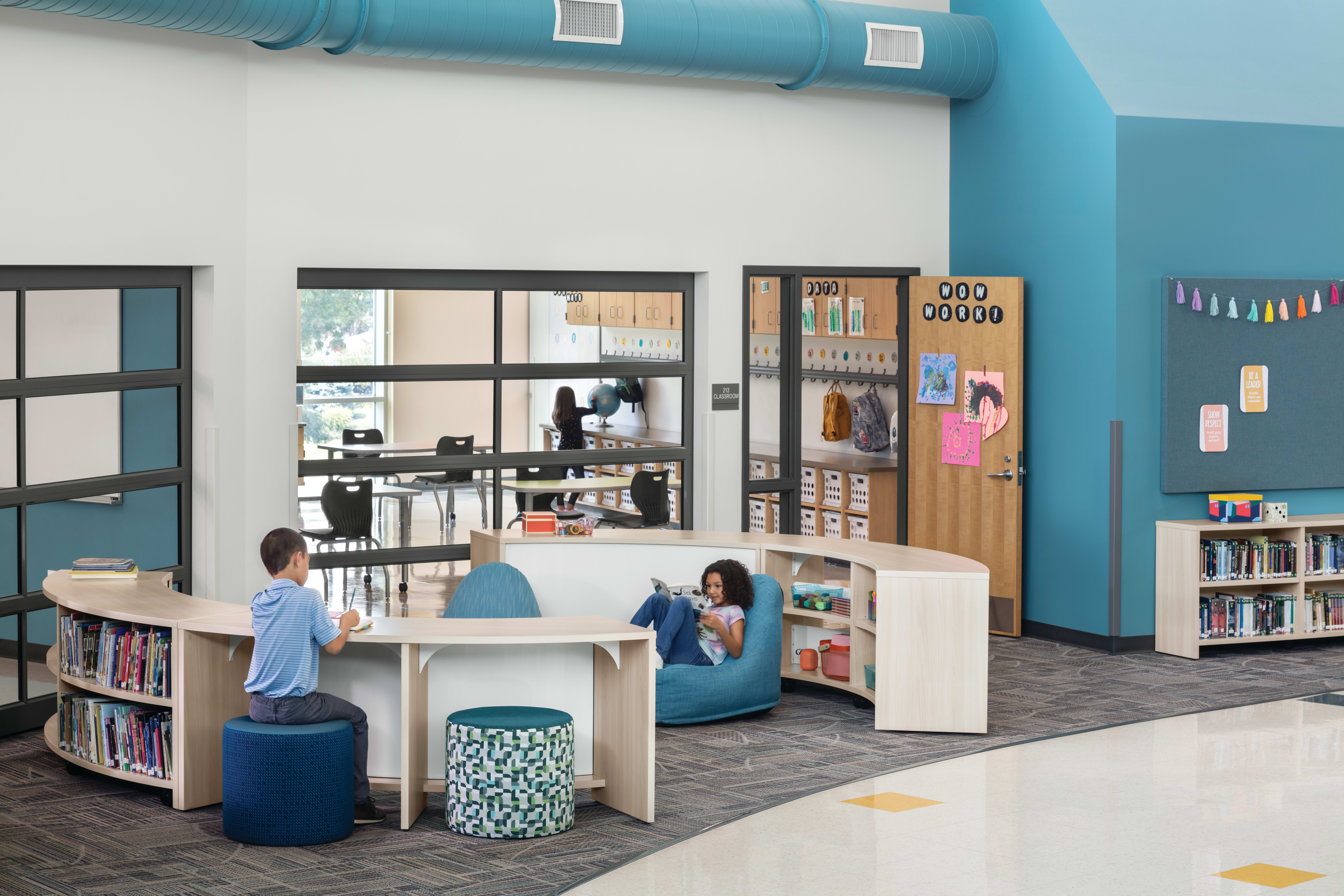 Storyline Bookcases and Bistro Tables with Confetti Floor Lounge and Flock Minis.