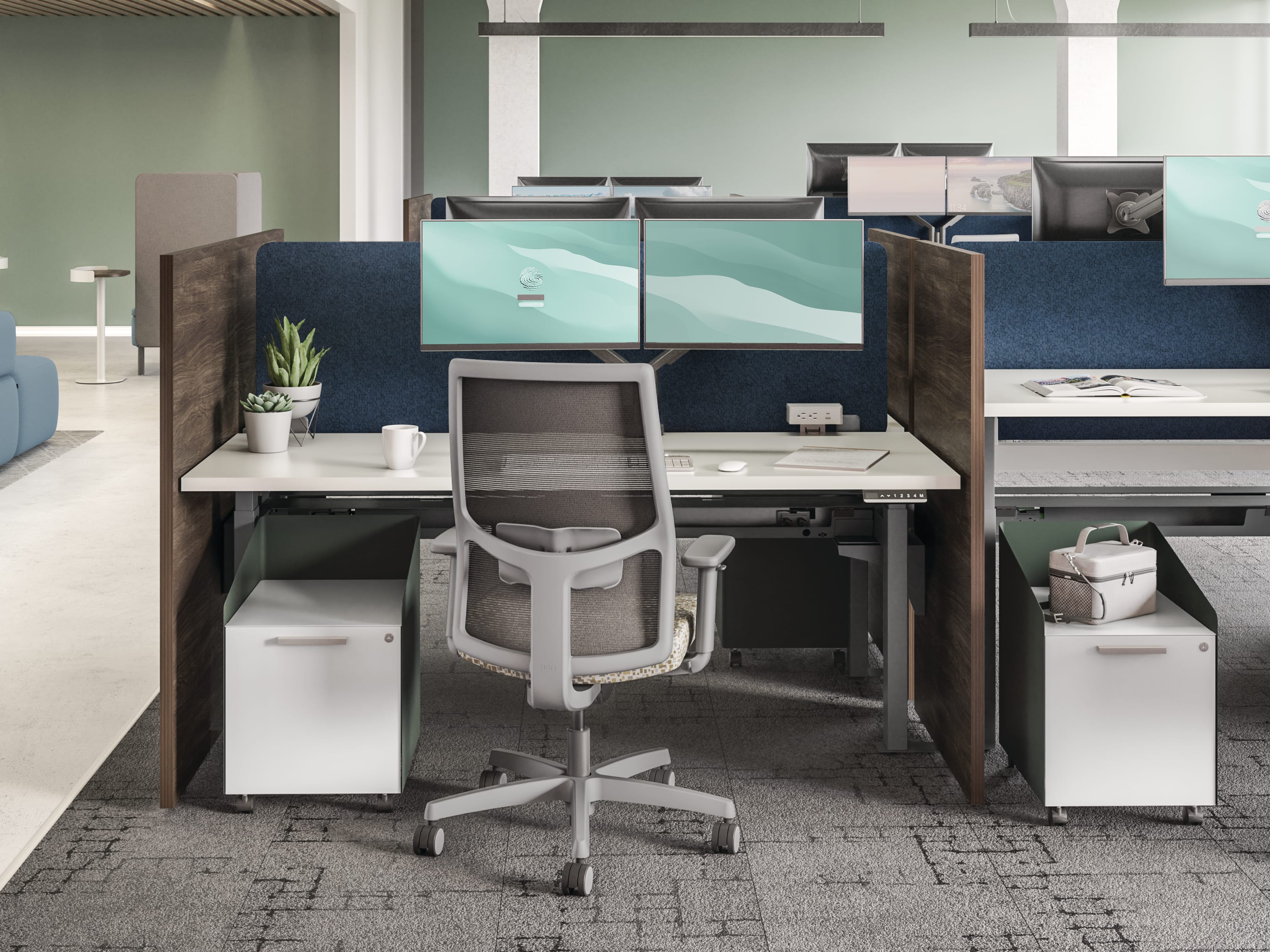 HON Empower workstations with Ignition seating adjacent to a touchdown collaborative space.