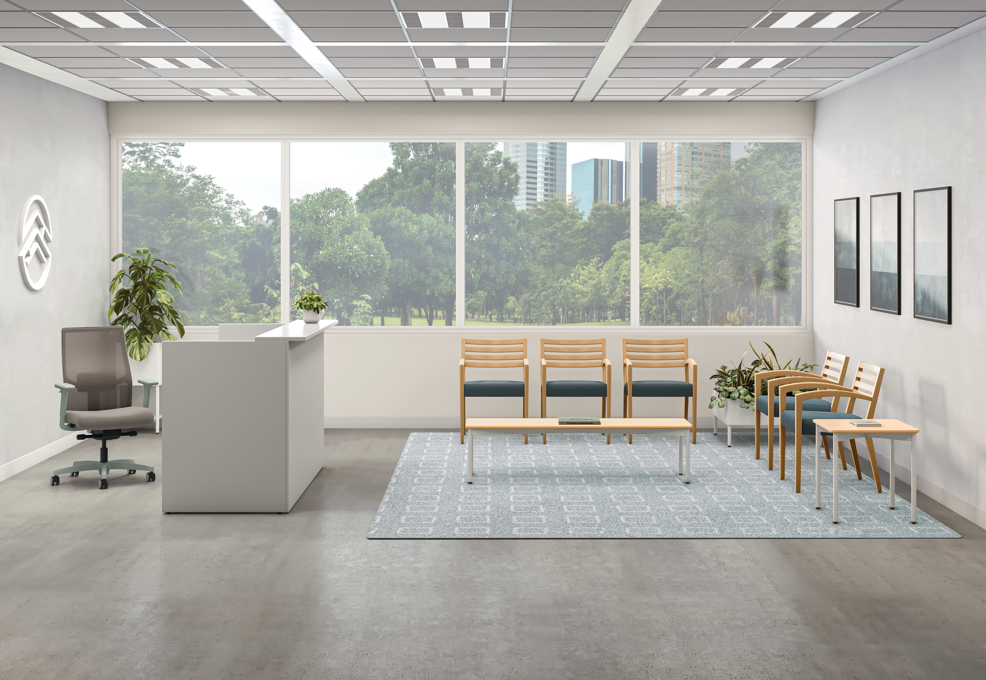 Modern office reception area with white desk, gray task chair, wood waiting chairs with blue seats, and large windows overlooking greenery.