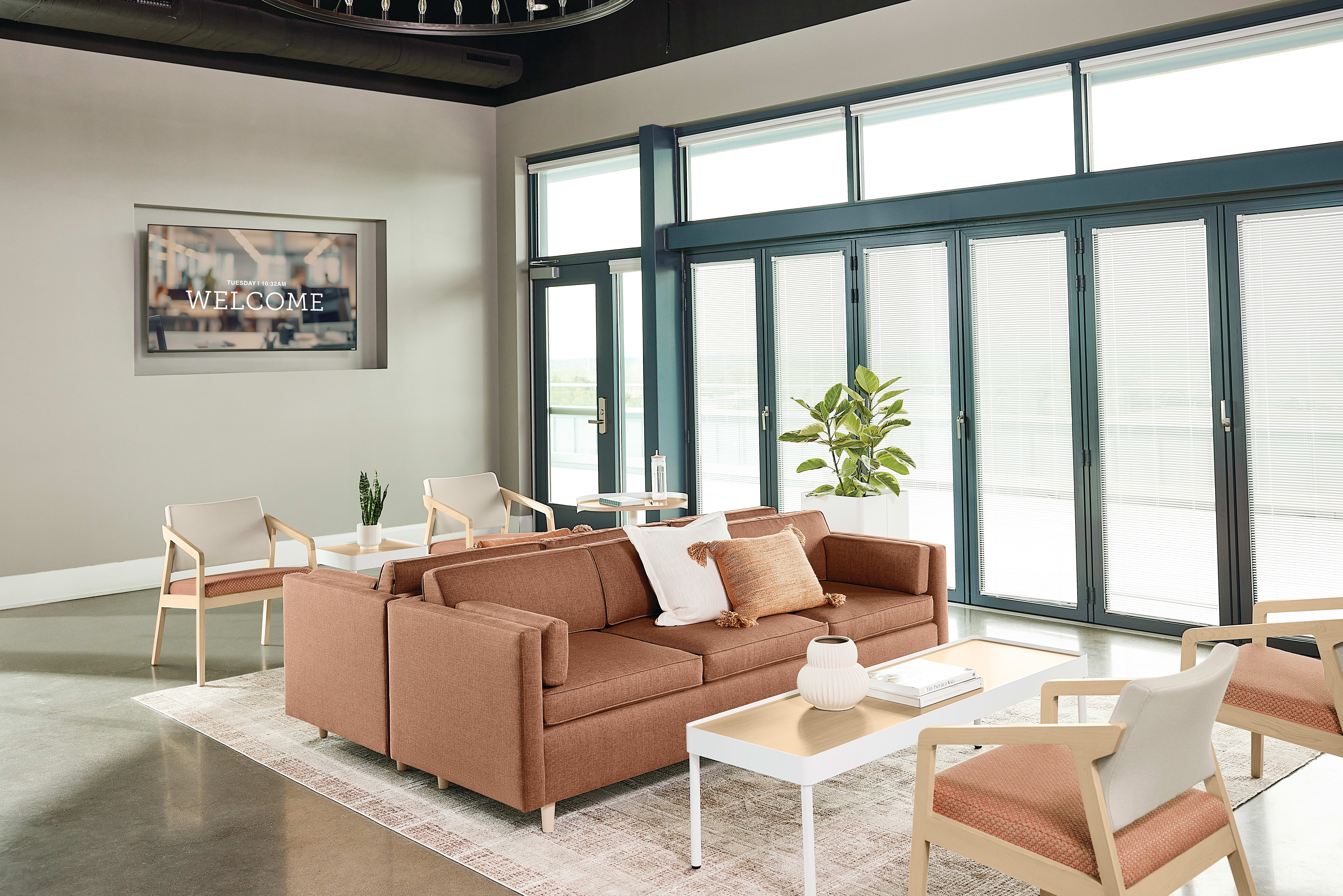 Confer chair with West Hill sofa and Sculpt tables 