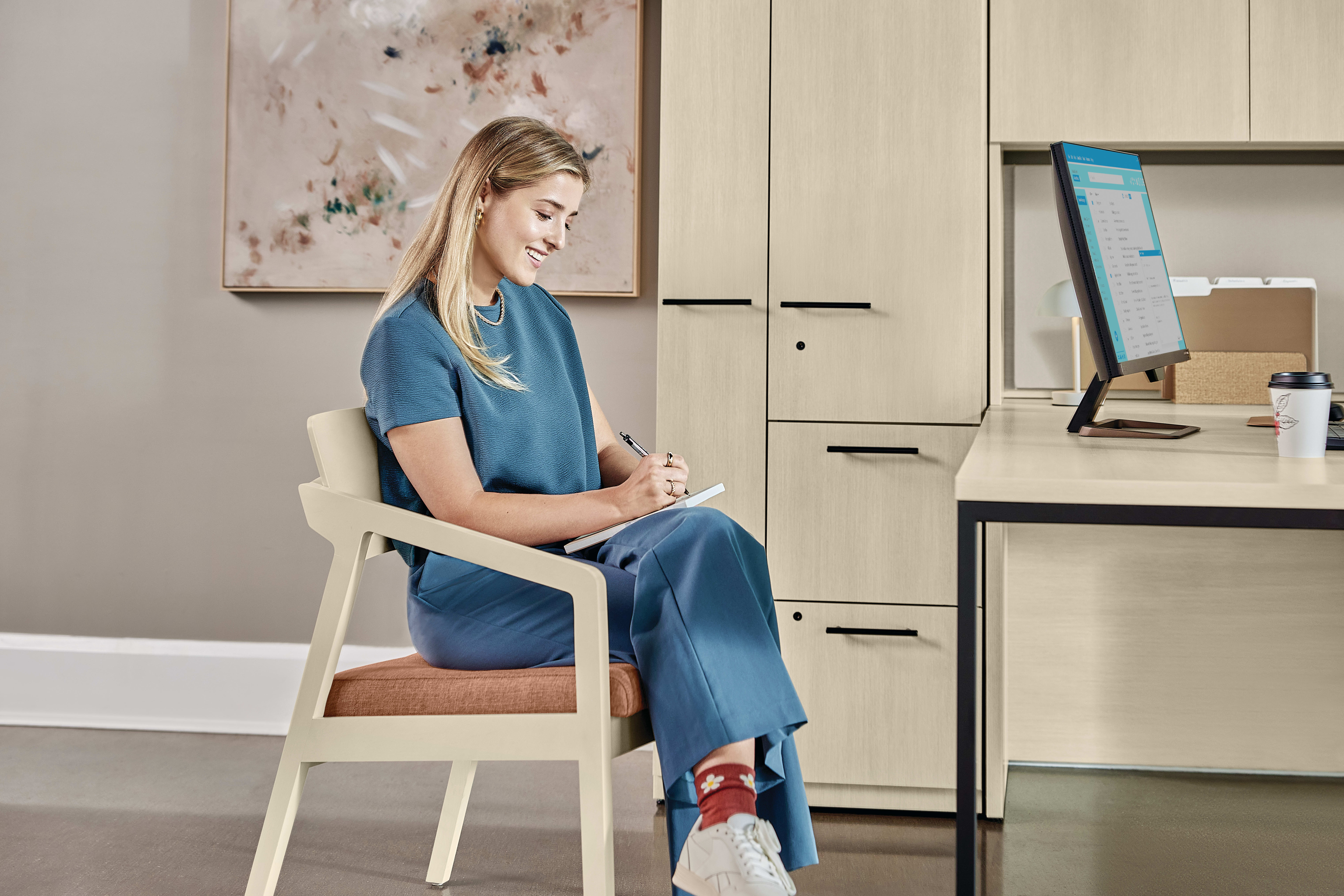 Confer chair with Concinnity desk