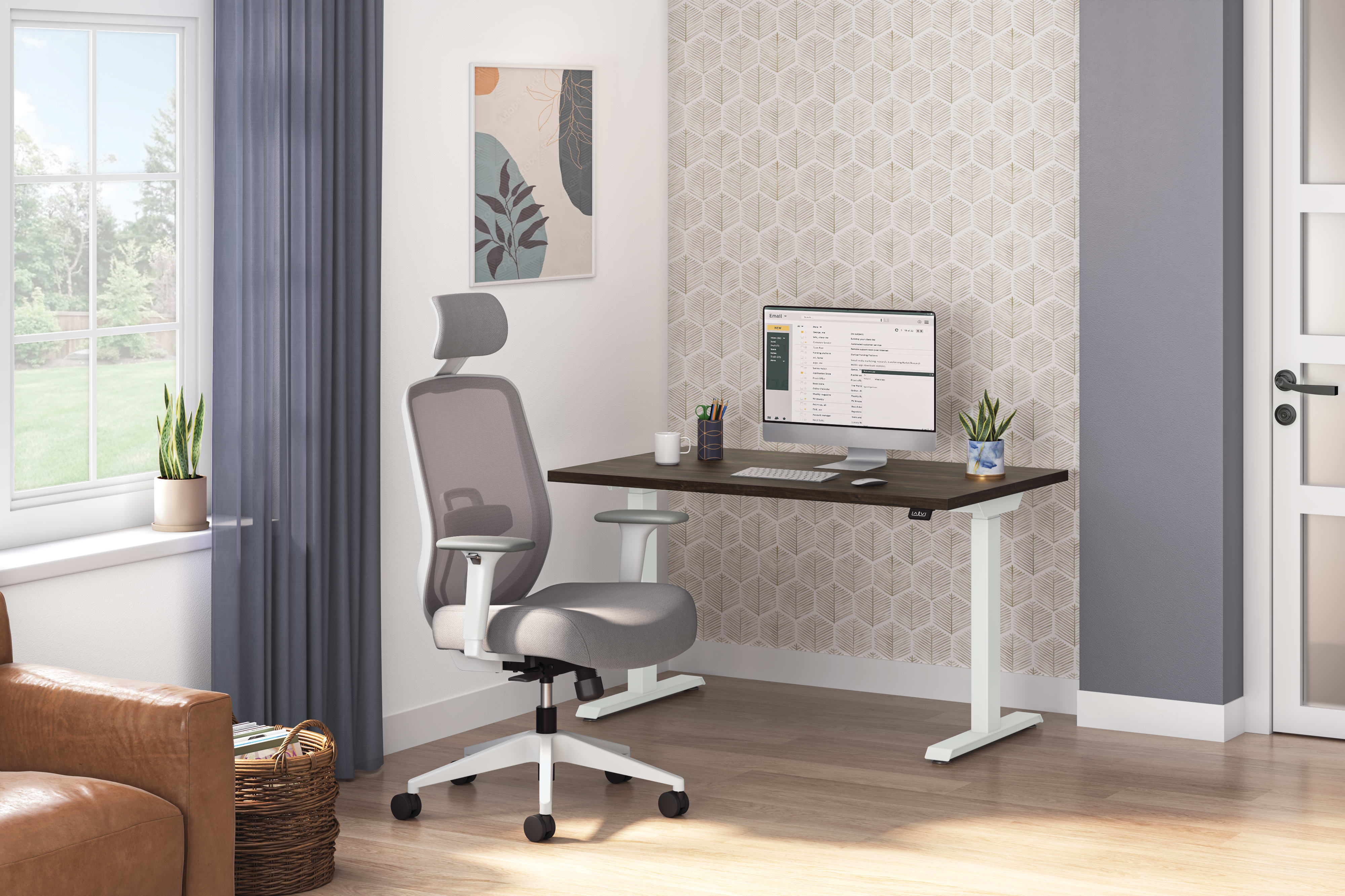 A modern and minimalist home office setup with a height-adjustable desk, an ergonomic office chair, and various decorative elements such as plants and artwork on the walls.
