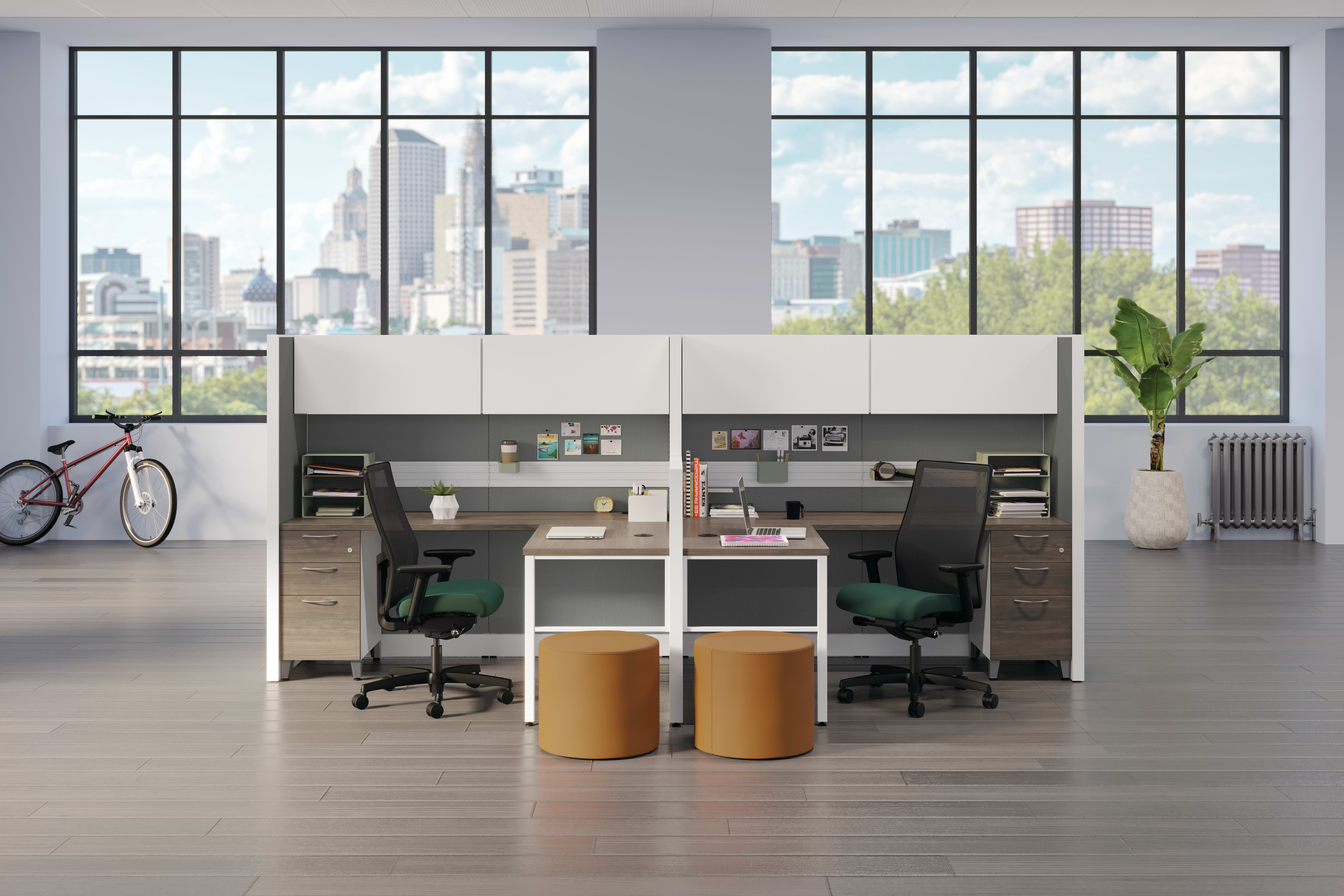 Accelerate workstations with Ignition task chairs in green fabric.