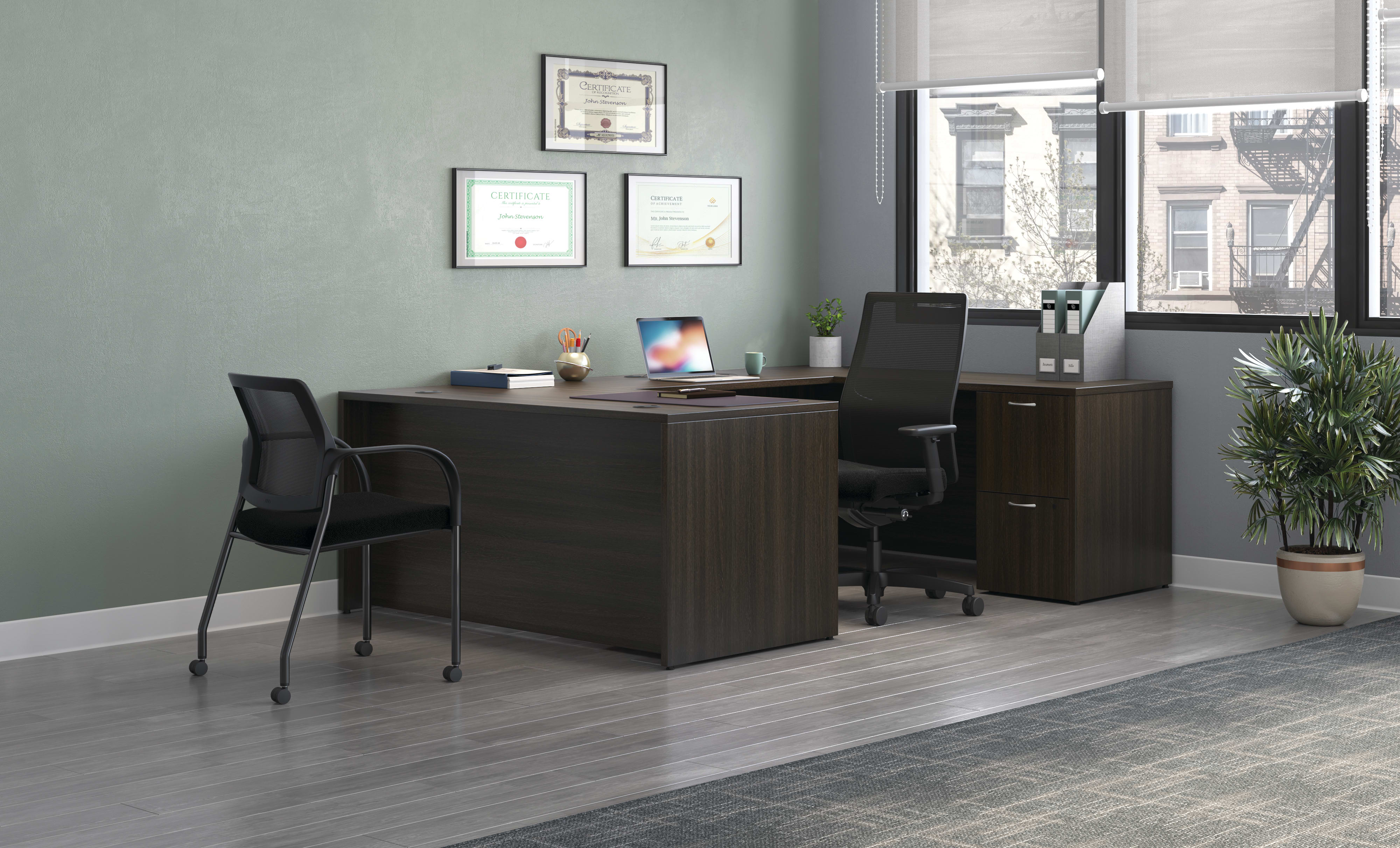 Mod desk with Ignition task and guest seating.