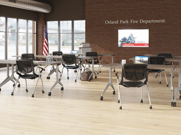 Motivate chairs with Motivate training tables.