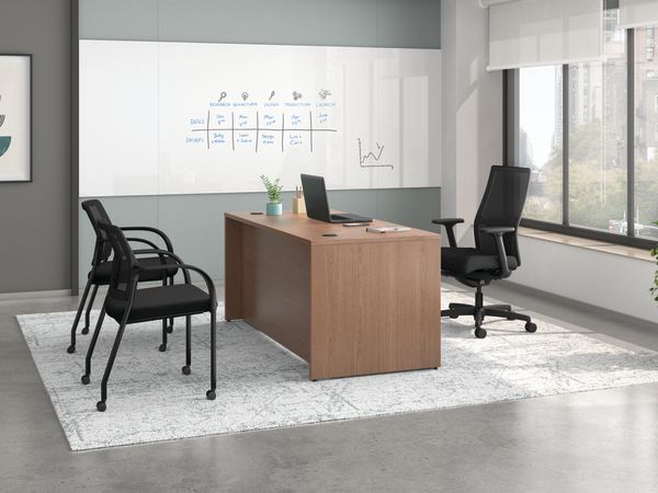 Mod desk with Ignition task and guest seating.