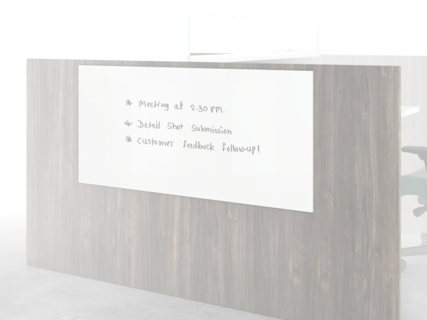 Gallery panel mounted markerboard on the end of a workstation.