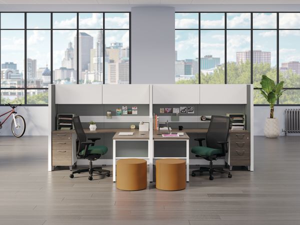 Accelerate workstations with Ignition task chairs in green fabric.