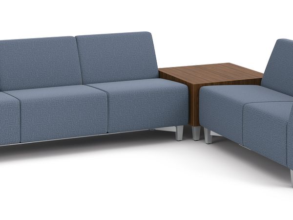 Flock 3-seat and 2-seat sofas in L-shape layout with cube table in between.