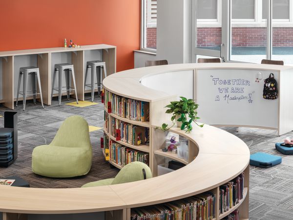 Storyline Bookcases and Bistro Tables with Confetti Floor Cushions and Lounges.