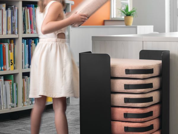 Storyline Bookcases with Confetti Floor Cushions.